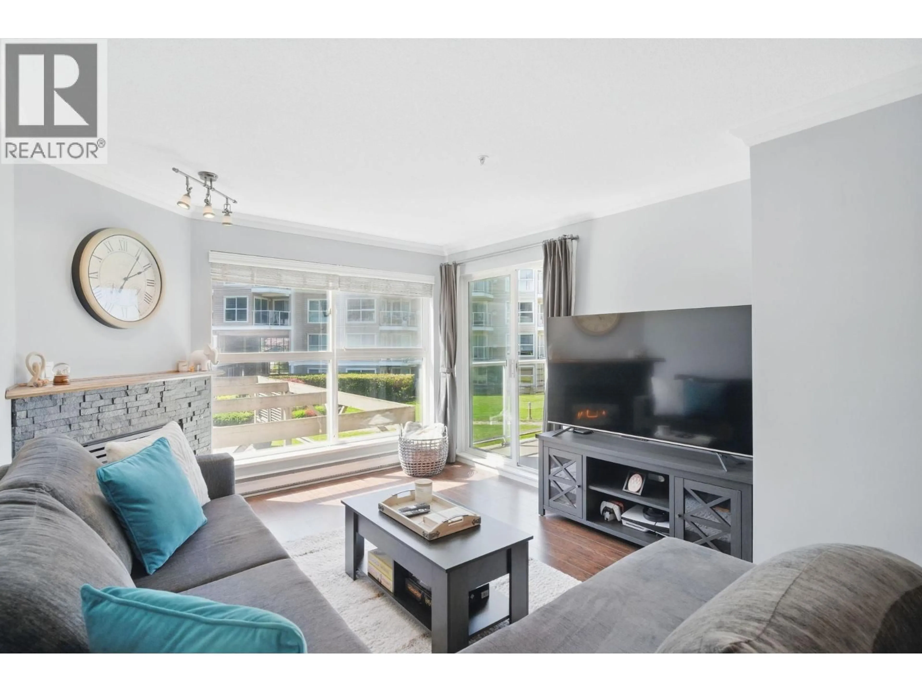 Living room with furniture, wood/laminate floor for 223 - 5880 DOVER CRESCENT, Richmond British Columbia V7C5P5