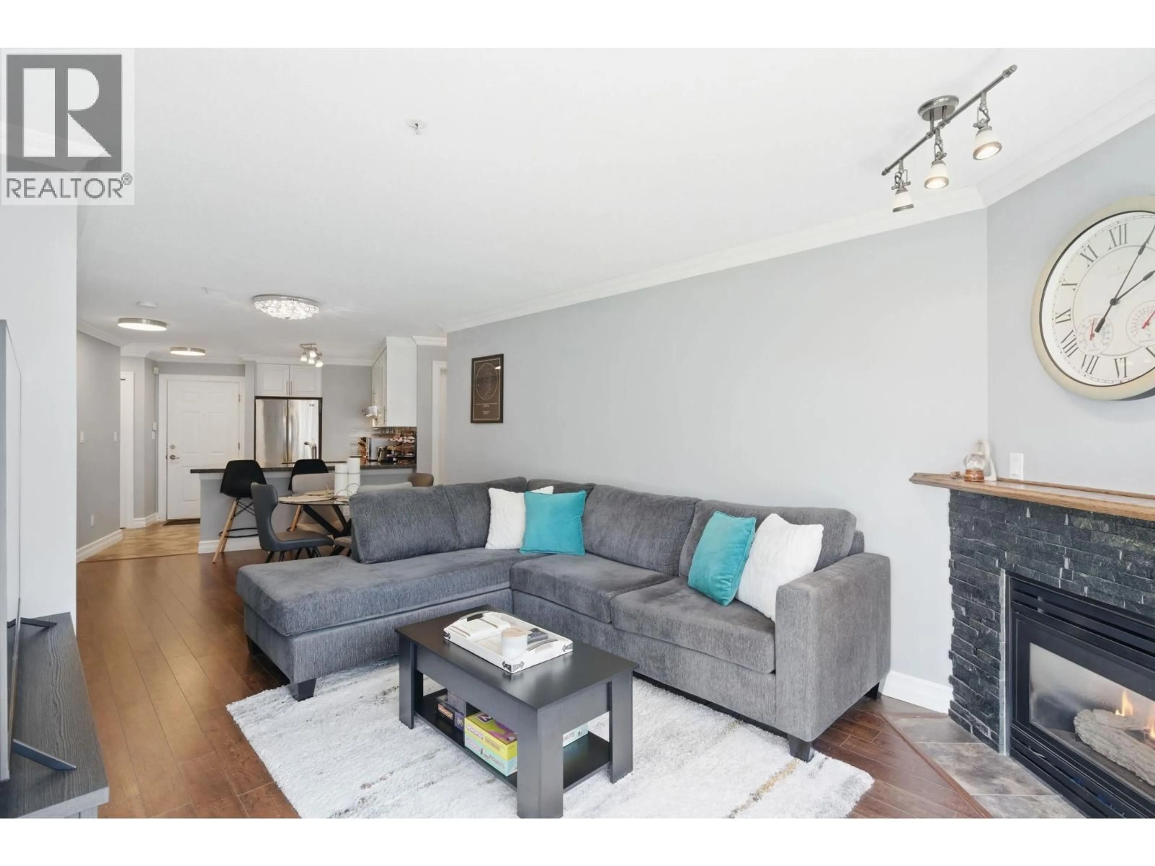 Living room with furniture, wood/laminate floor for 223 - 5880 DOVER CRESCENT, Richmond British Columbia V7C5P5