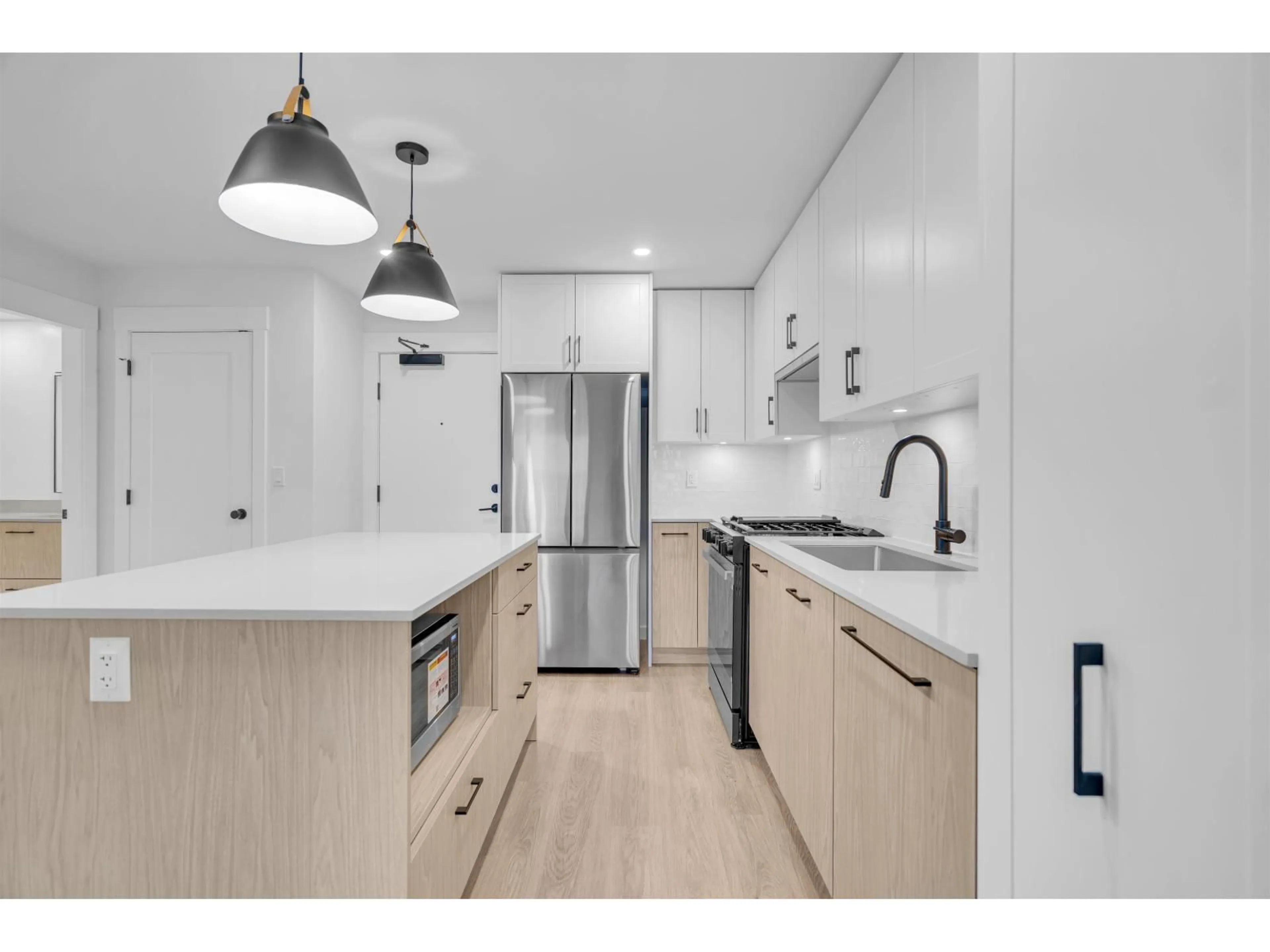 Open concept kitchen, unknown for 412 - 27249 ALDERGROVE TOWN CENTRE DRIVE, Langley British Columbia V4W3N7