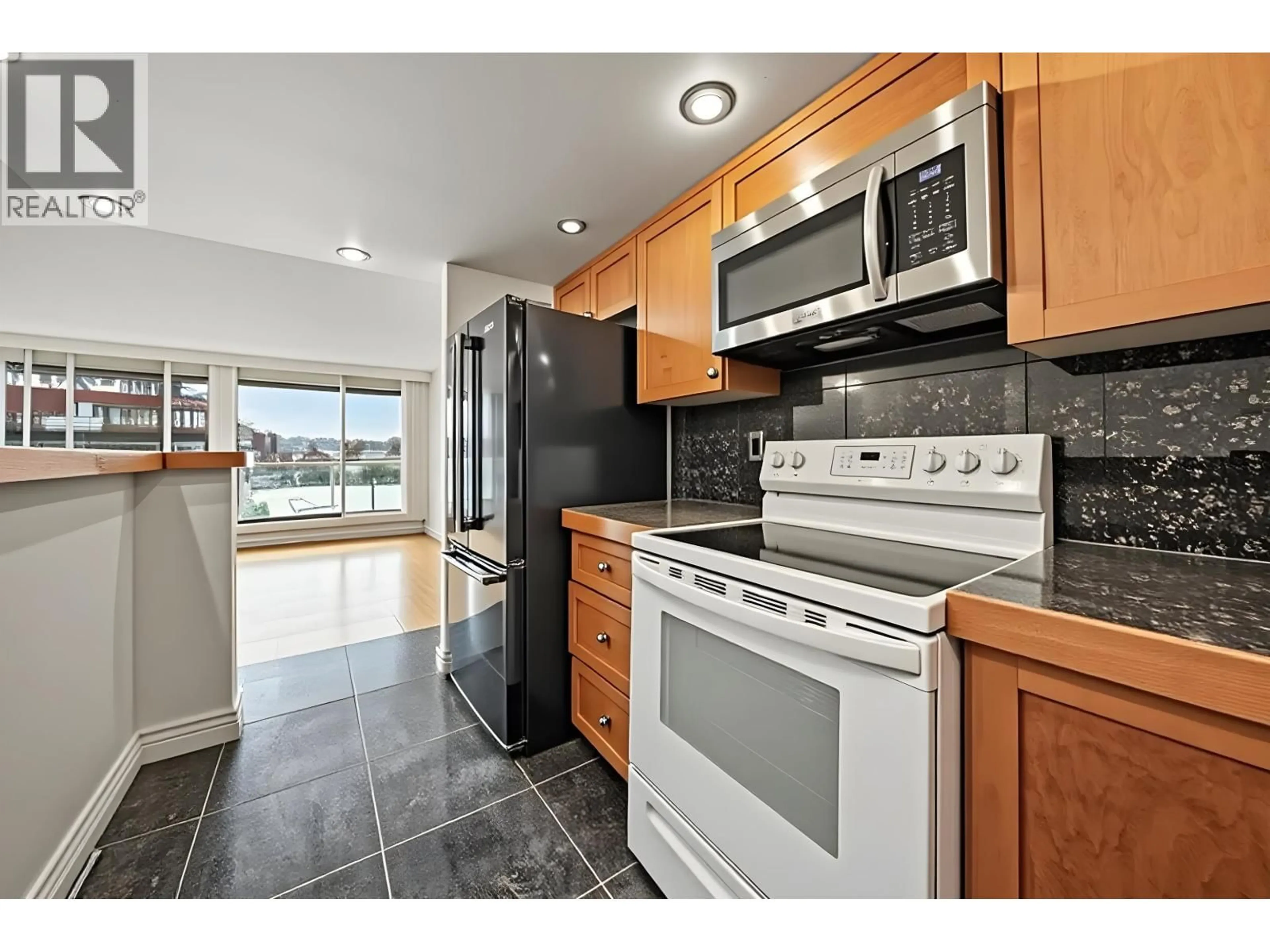 Standard kitchen, ceramic/tile floor for 205 - 1600 HOWE STREET, Vancouver British Columbia V6Z2L9