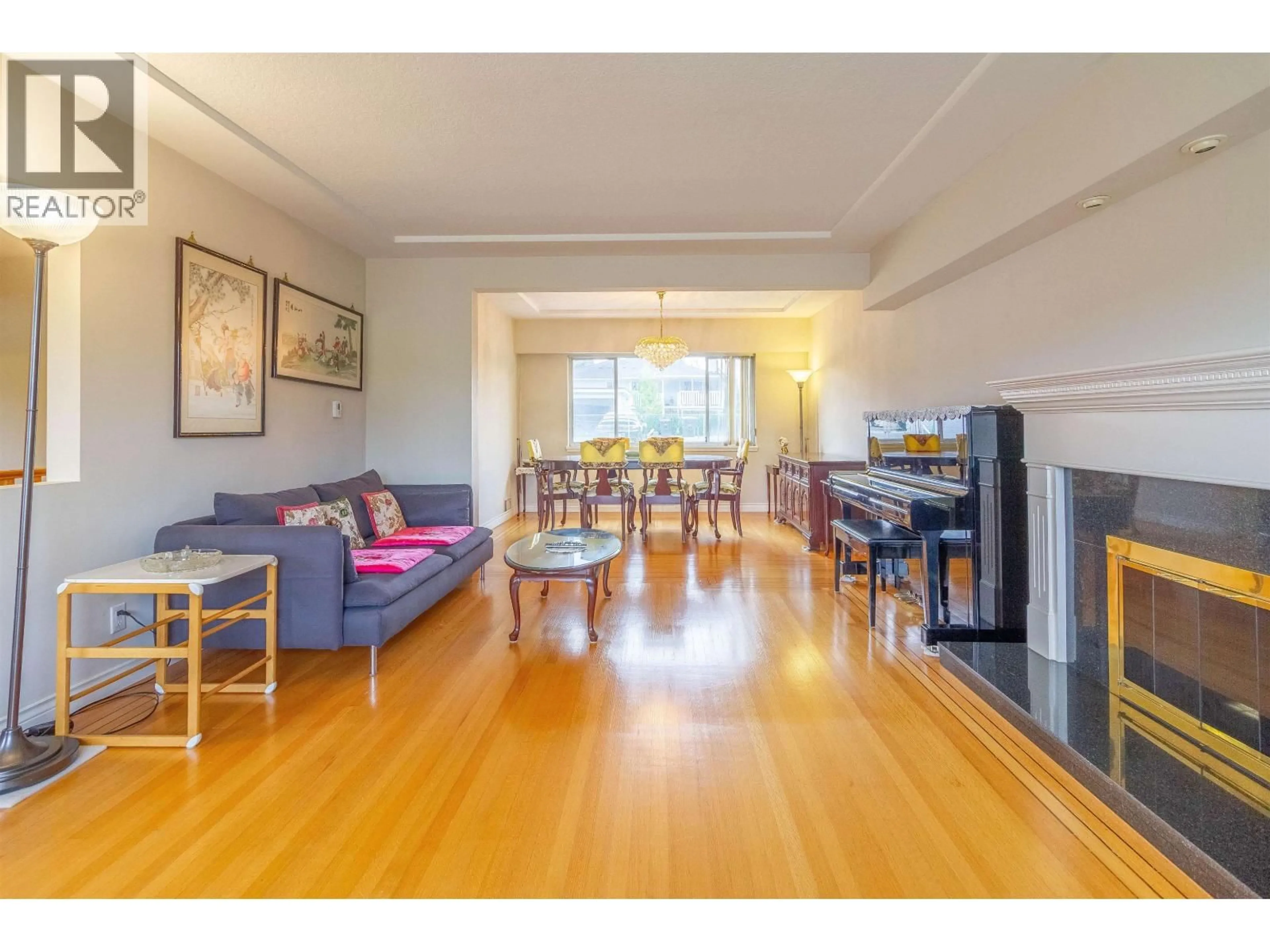 Living room with furniture, wood/laminate floor for 4810 FAIRLAWN DRIVE, Burnaby British Columbia V5C3R8