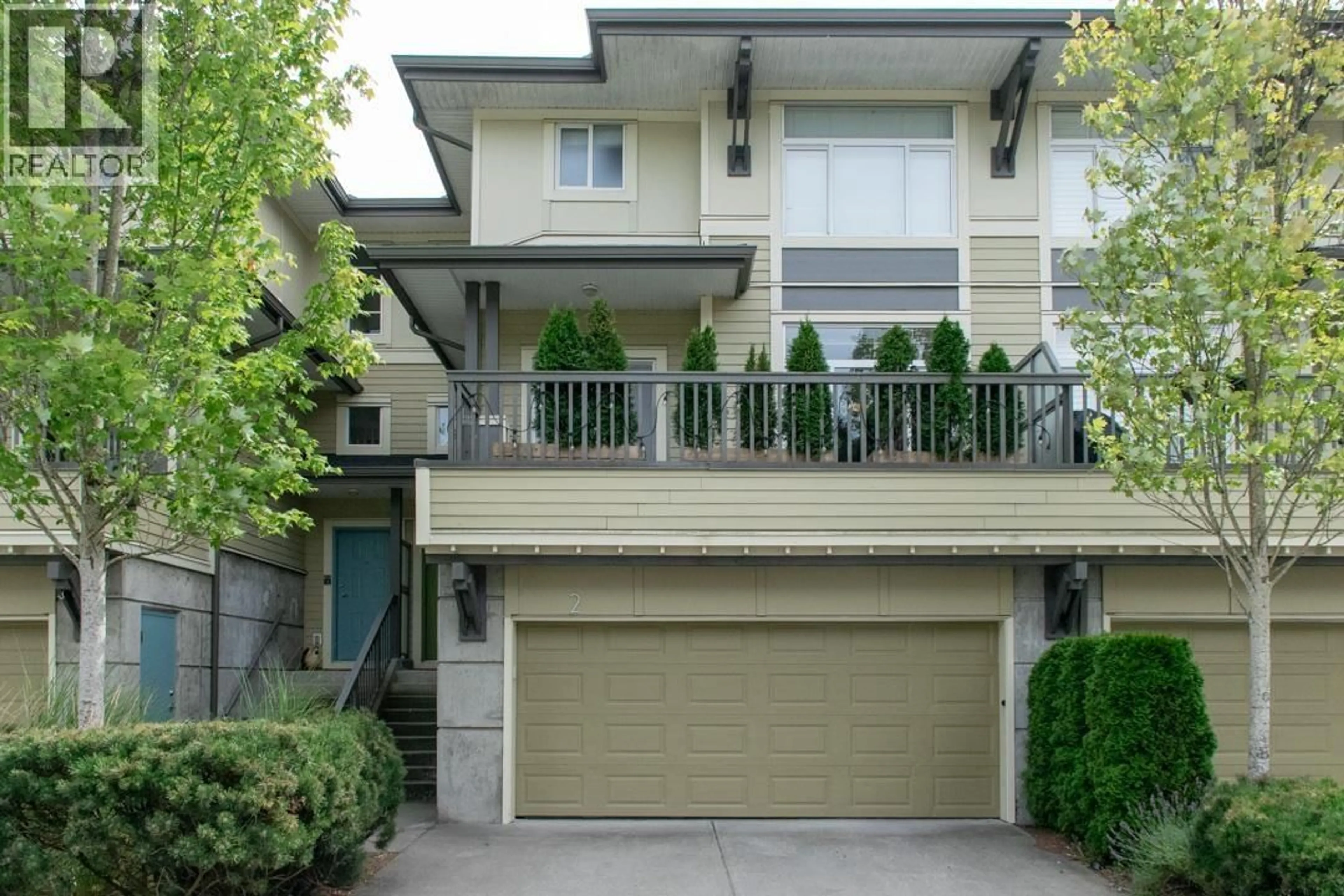 Home with vinyl exterior material, street for 2 - 40632 GOVERNMENT ROAD, Squamish British Columbia V8B0M7