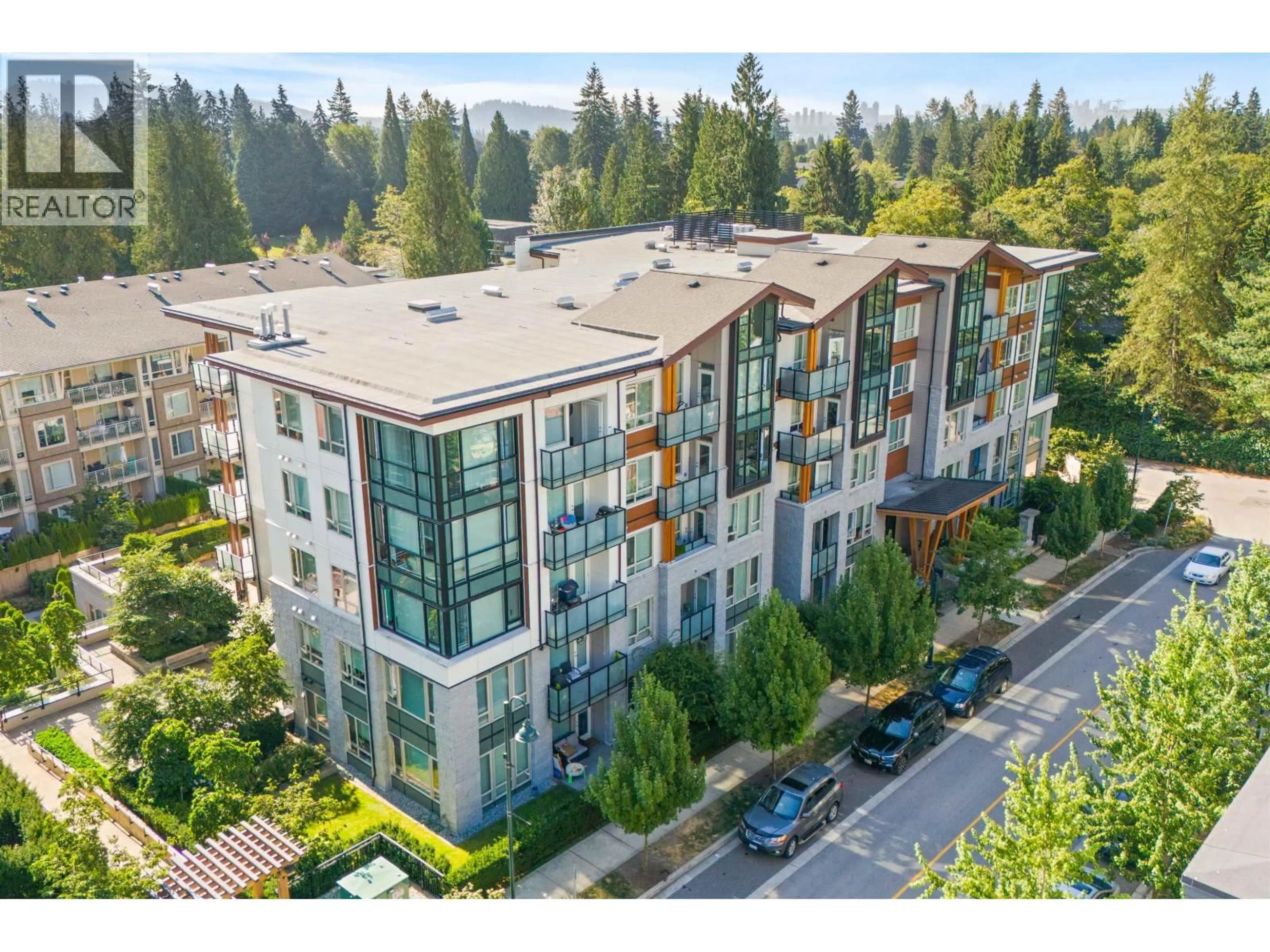 A pic from outside/outdoor area/front of a property/back of a property/a pic from drone, unknown for 101 - 2632 LIBRARY LANE, North Vancouver British Columbia V7J0B8