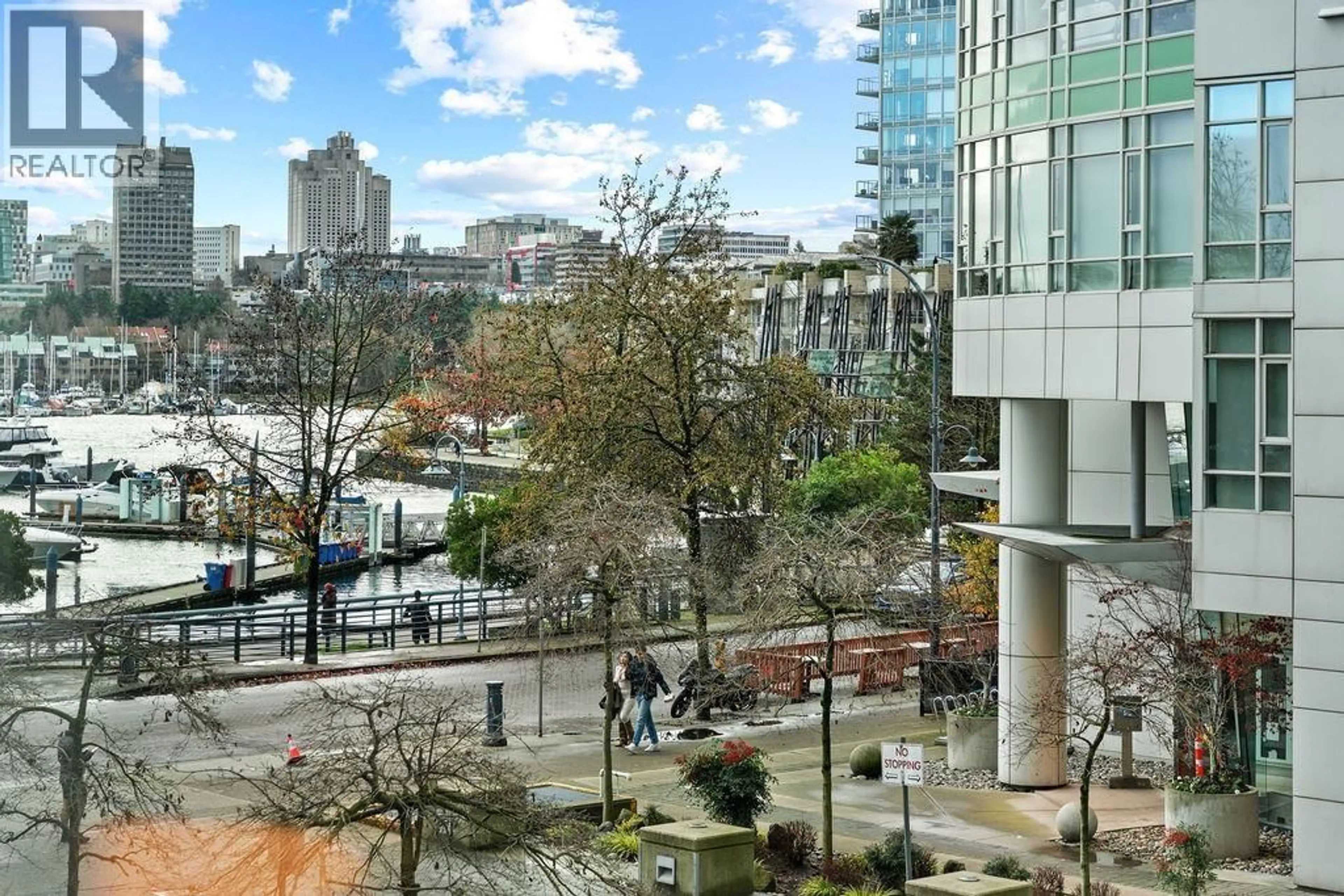 Patio, city buildings view from balcony for 123 AQUARIUS MEWS, Vancouver British Columbia V6Z2Z1