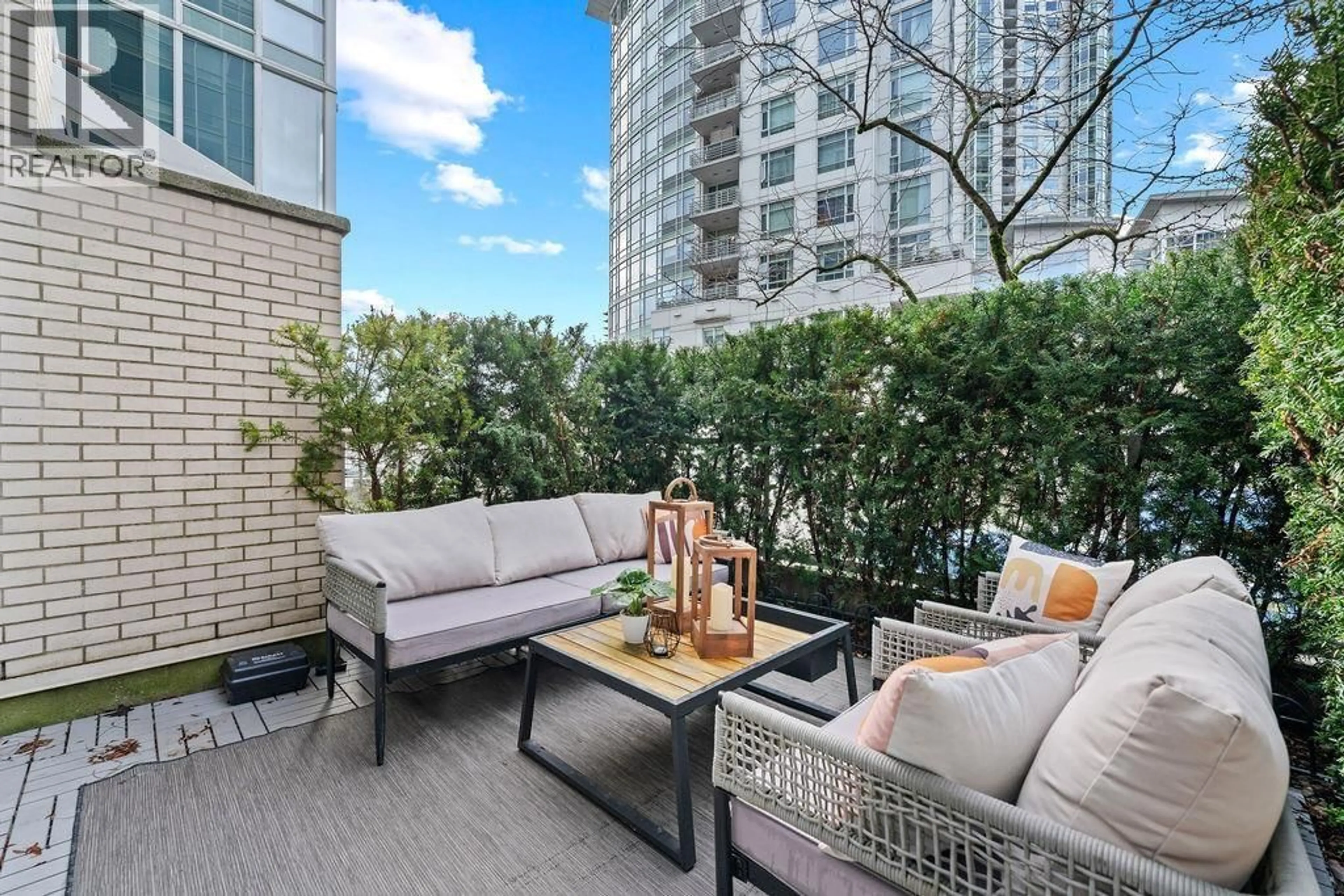 Patio, city buildings view from balcony for 123 AQUARIUS MEWS, Vancouver British Columbia V6Z2Z1