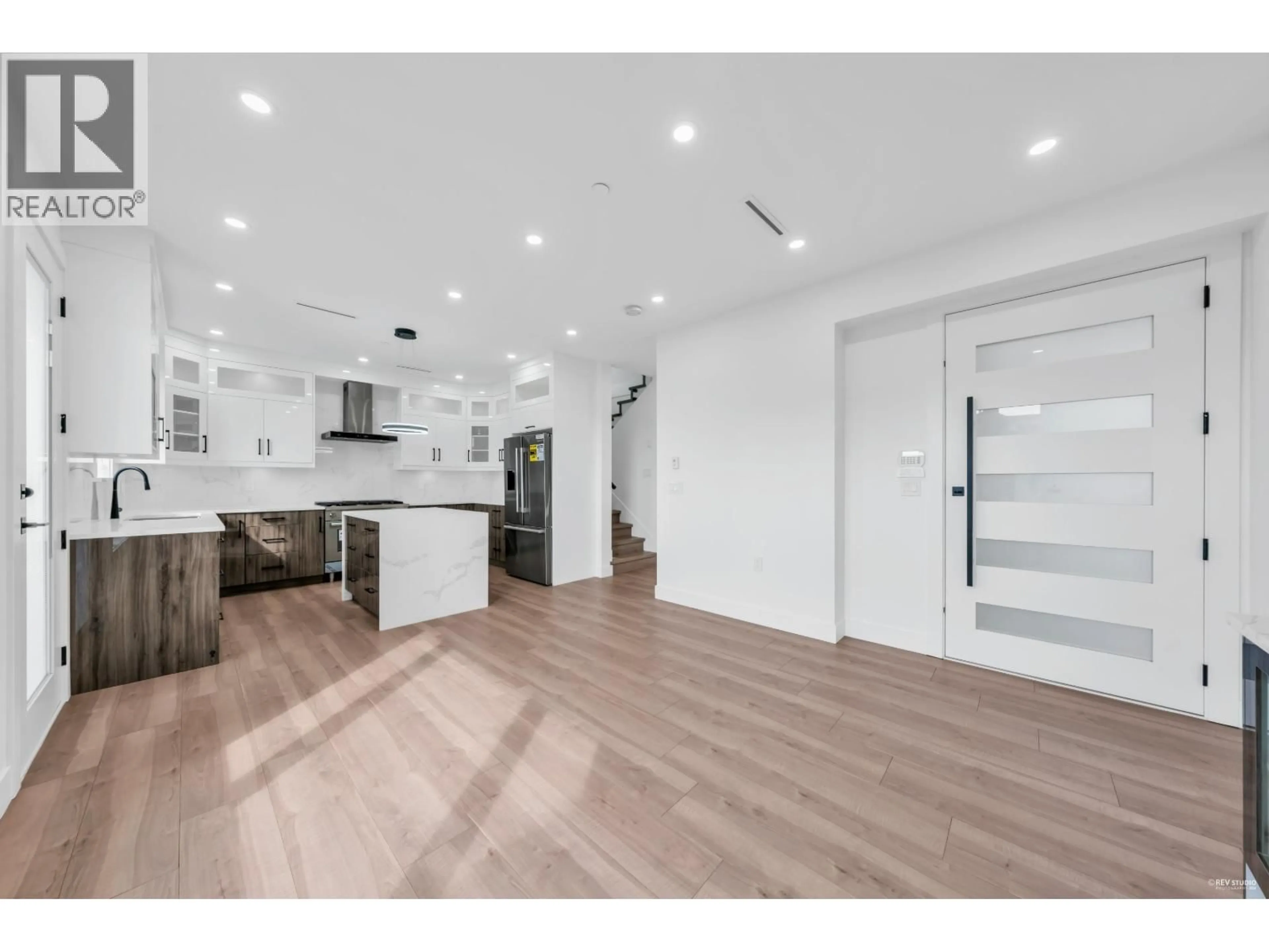 Open concept kitchen, wood/laminate floor for 2 - 3344 ADANAC STREET, Vancouver British Columbia V5K2P3