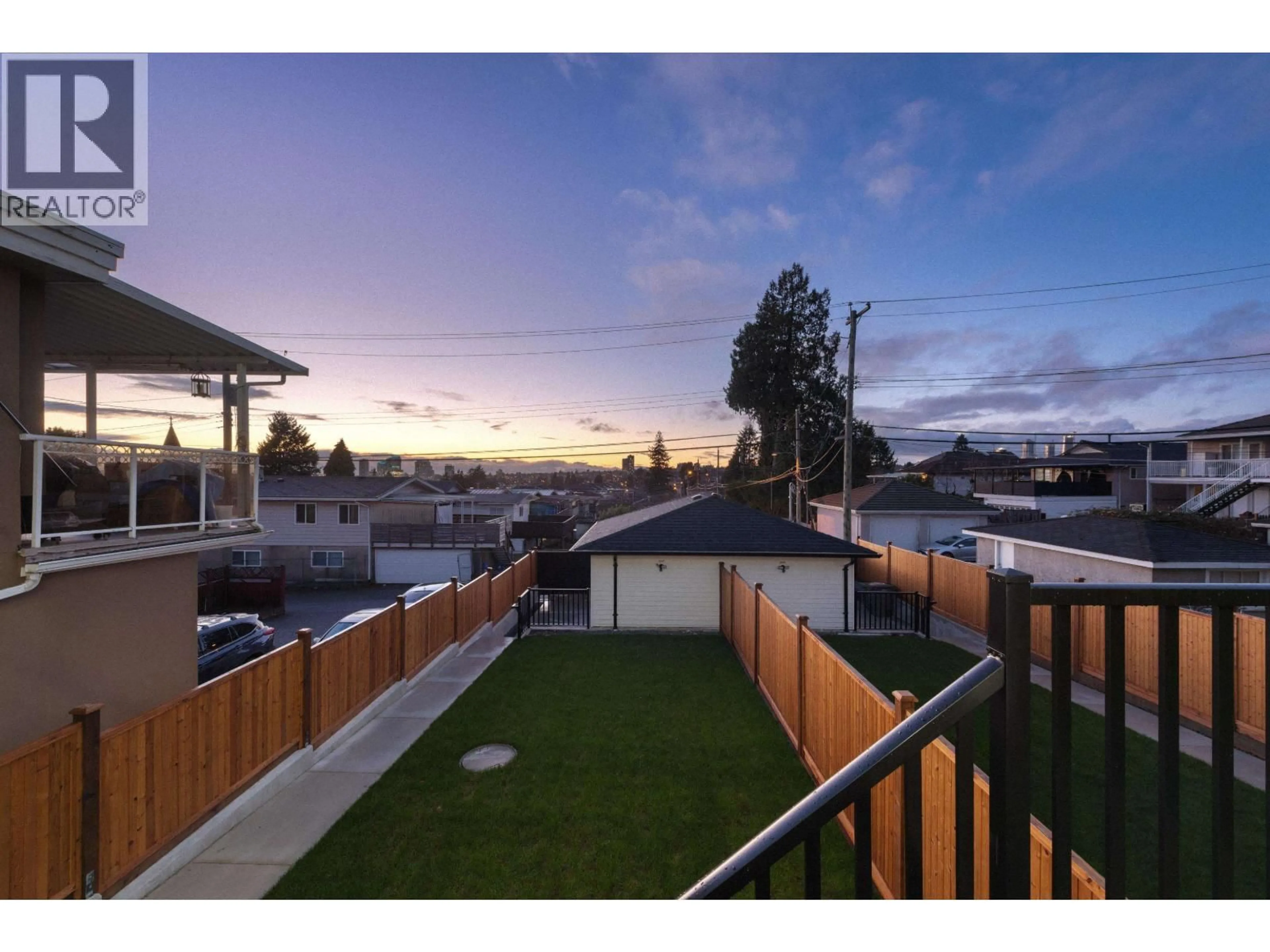 A pic from outside/outdoor area/front of a property/back of a property/a pic from drone, mountain view for 2 - 7361 FRASER STREET, Vancouver British Columbia V5X3W1