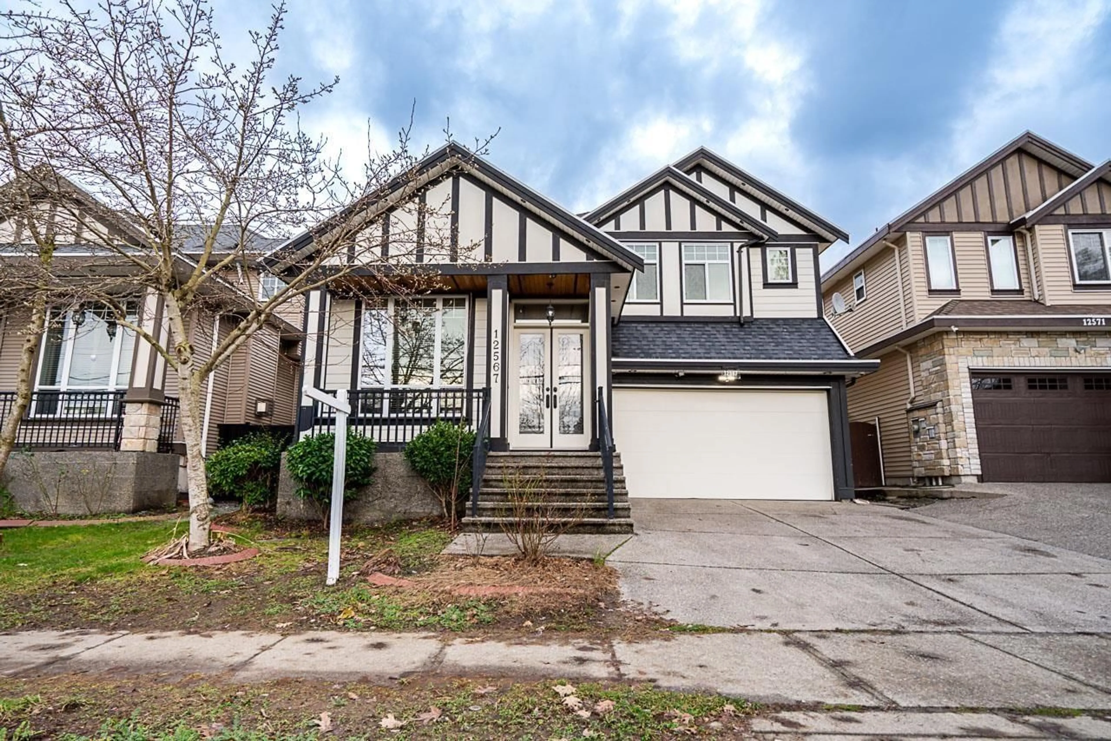 Home with vinyl exterior material, street for 12567 66 AVENUE, Surrey British Columbia V3W1V6