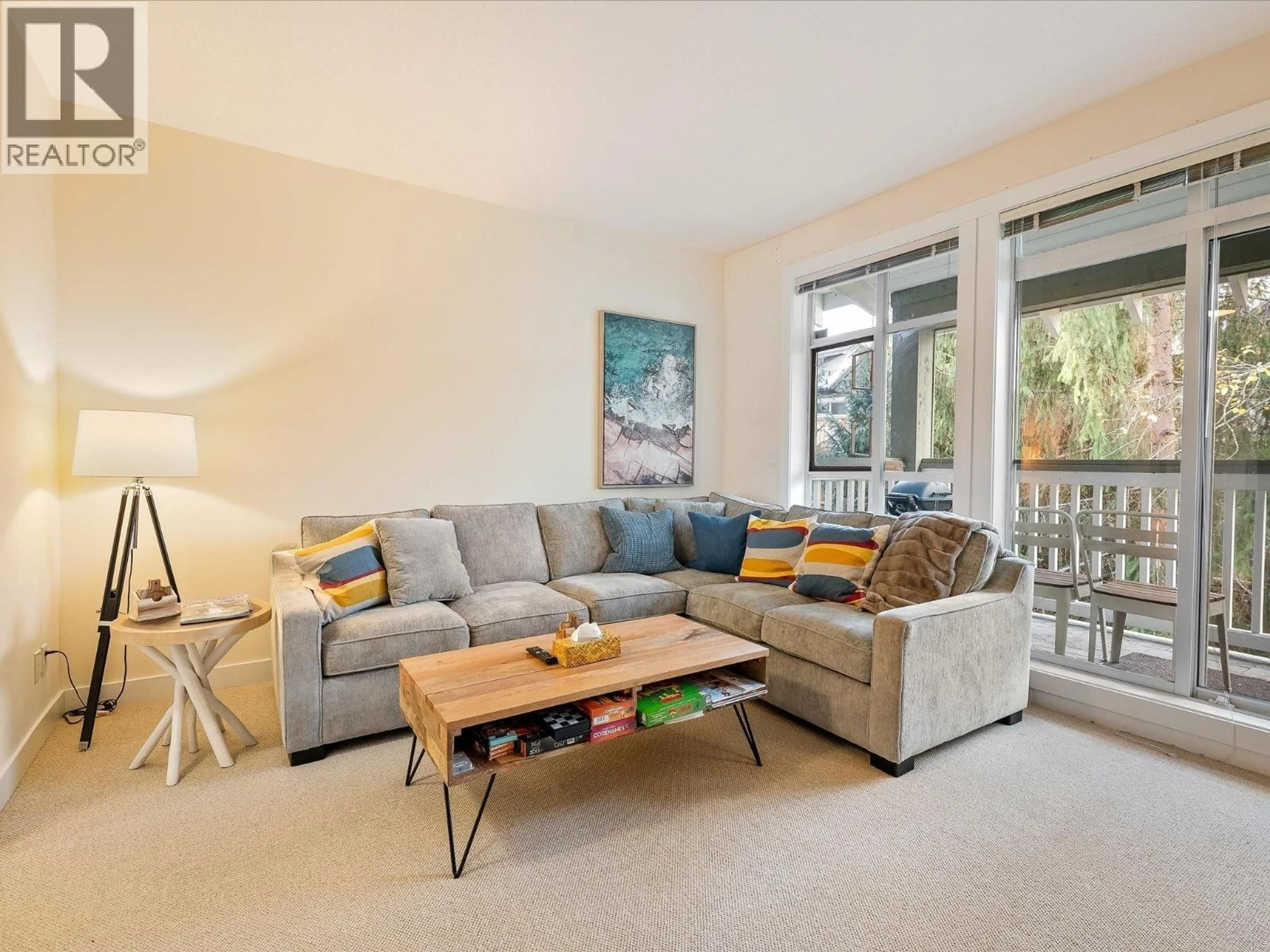 Living room with furniture, unknown for 203 - 4405 BLACKCOMB WAY, Whistler British Columbia V8E0X7