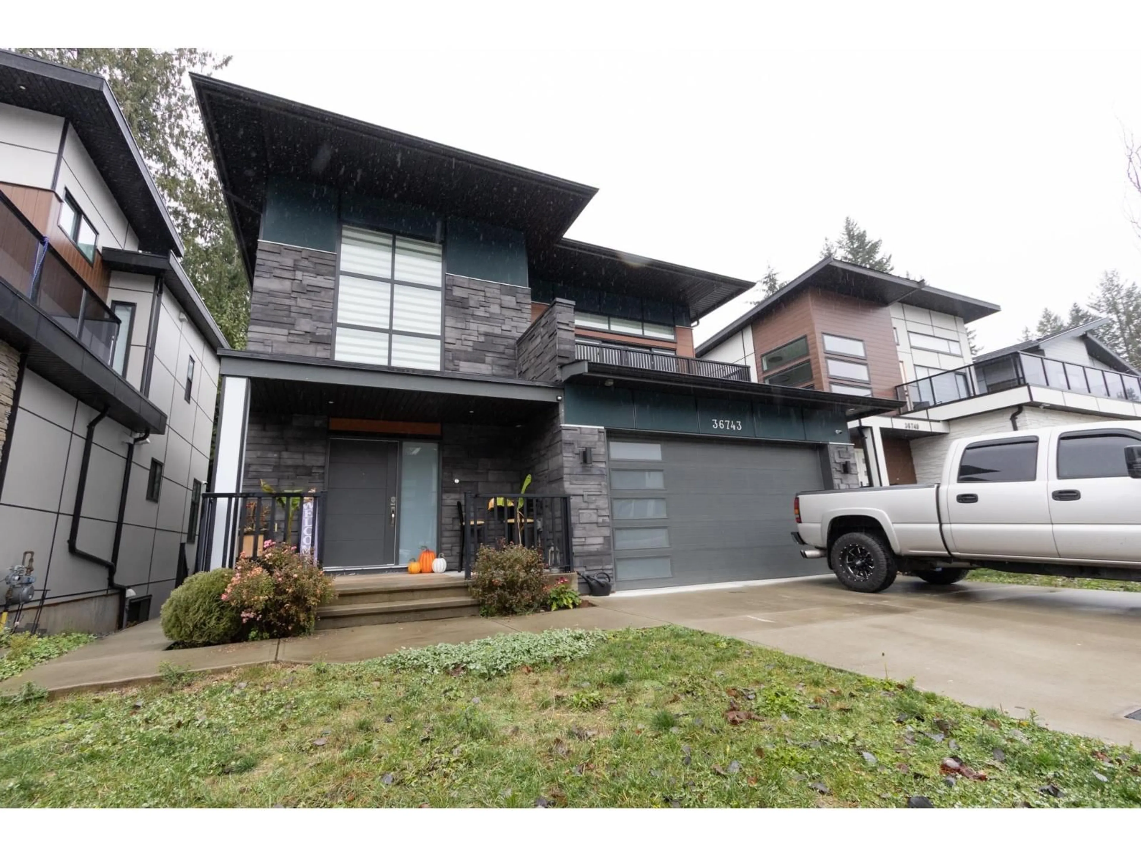 Home with vinyl exterior material, street for 36743 CARL CREEK CRESCENT, Abbotsford British Columbia V3G0H4