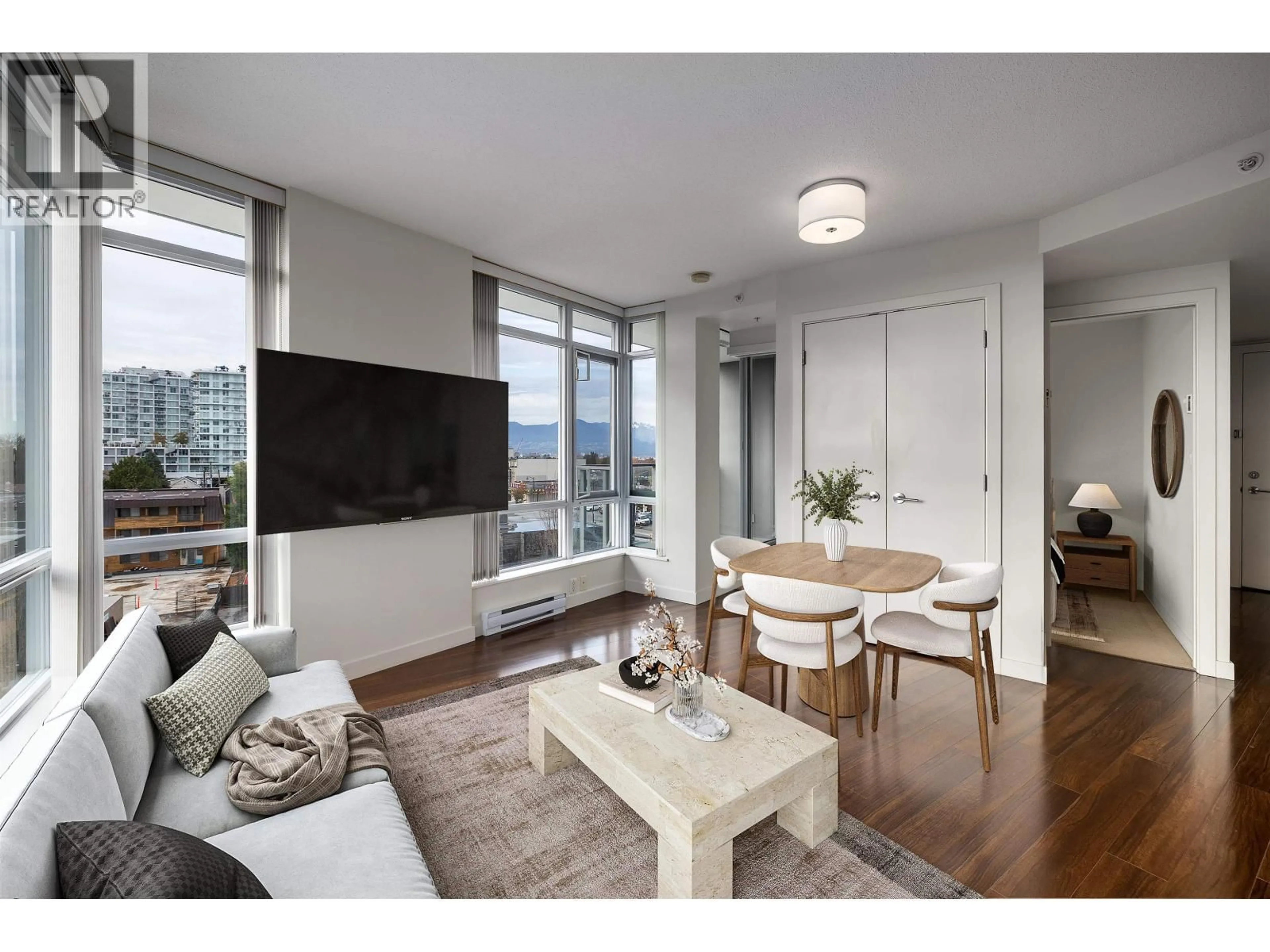 Living room with furniture, wood/laminate floor for 509 - 4815 ELDORADO MEWS, Vancouver British Columbia V5R0B2