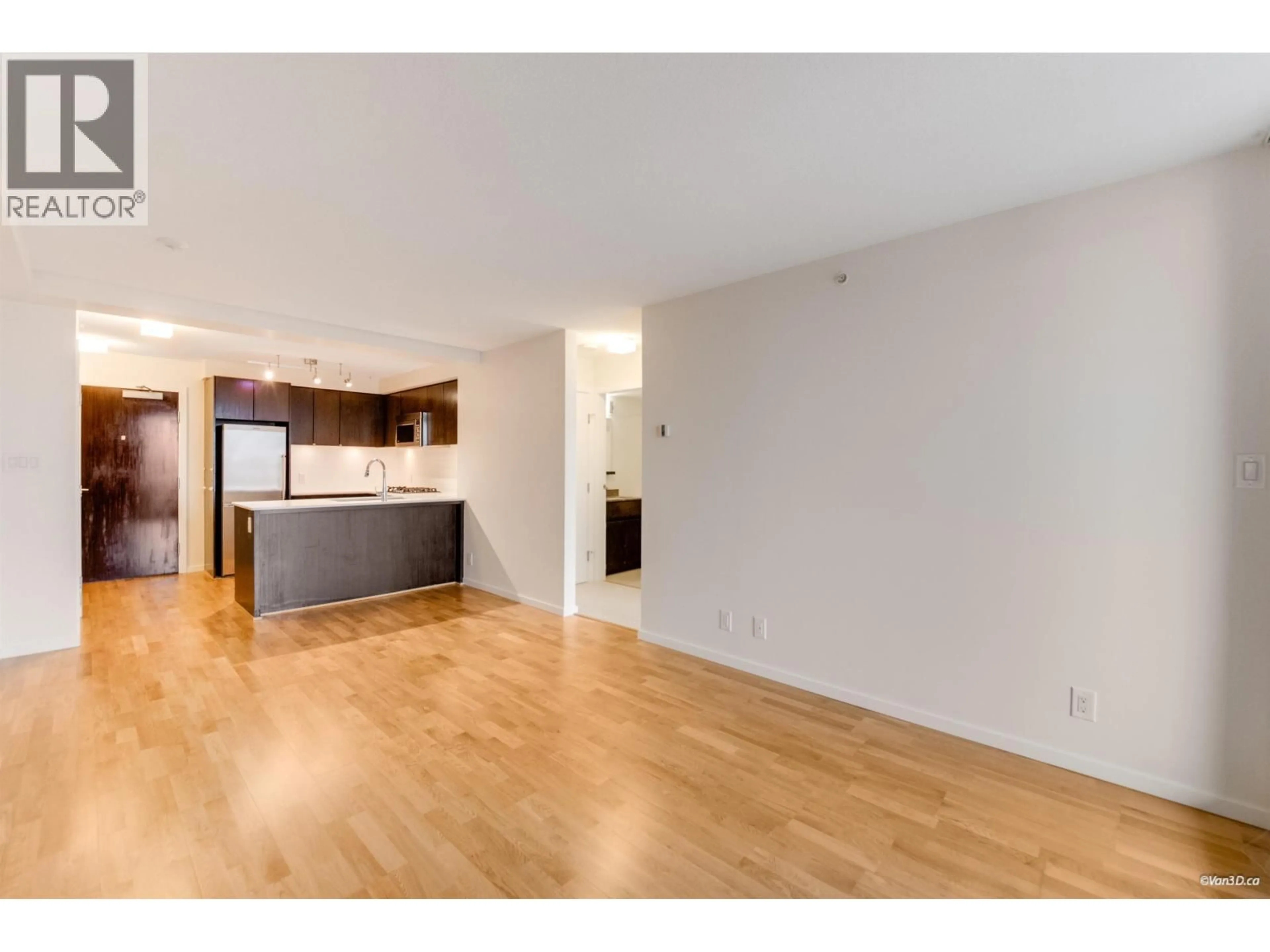 Open concept kitchen, wood/laminate floor for 1503 - 7979 FIRBRIDGE WAY, Richmond British Columbia V6X0K7