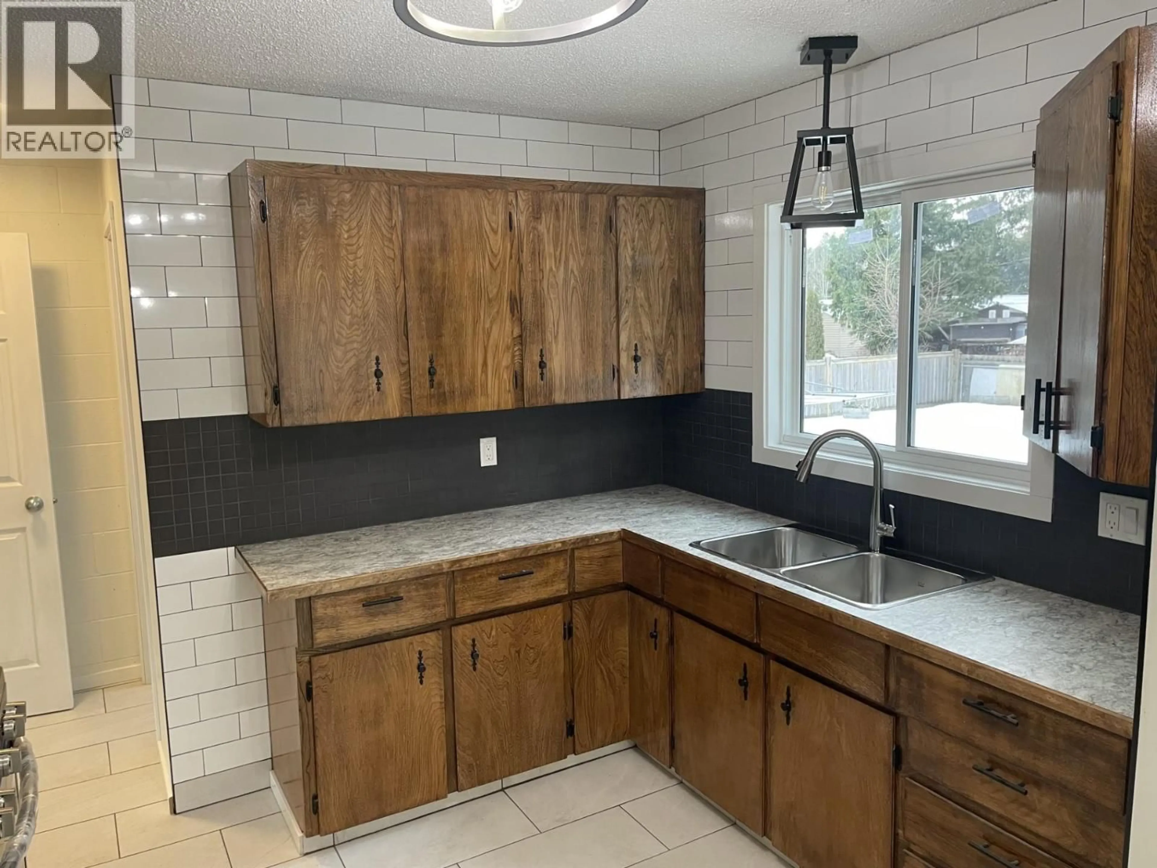 Standard kitchen, ceramic/tile floor for 2301 PEAR STREET, Terrace British Columbia V8G2R2