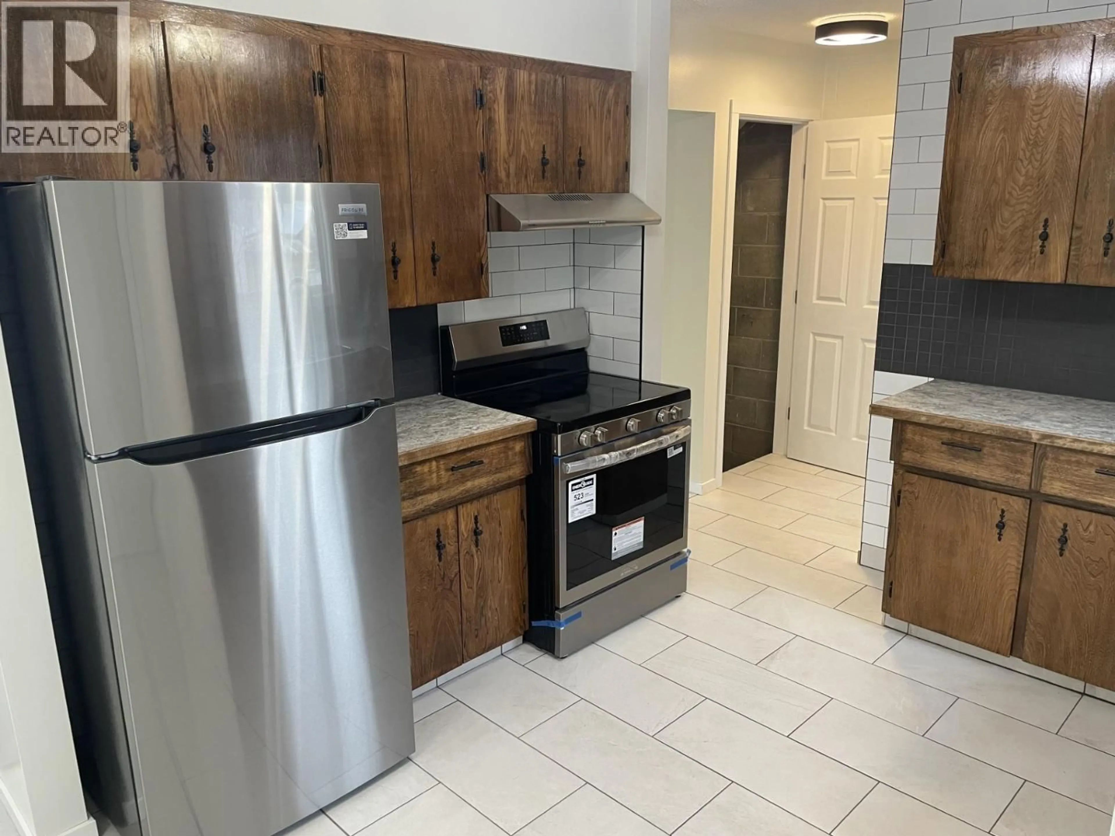 Standard kitchen, ceramic/tile floor for 2301 PEAR STREET, Terrace British Columbia V8G2R2