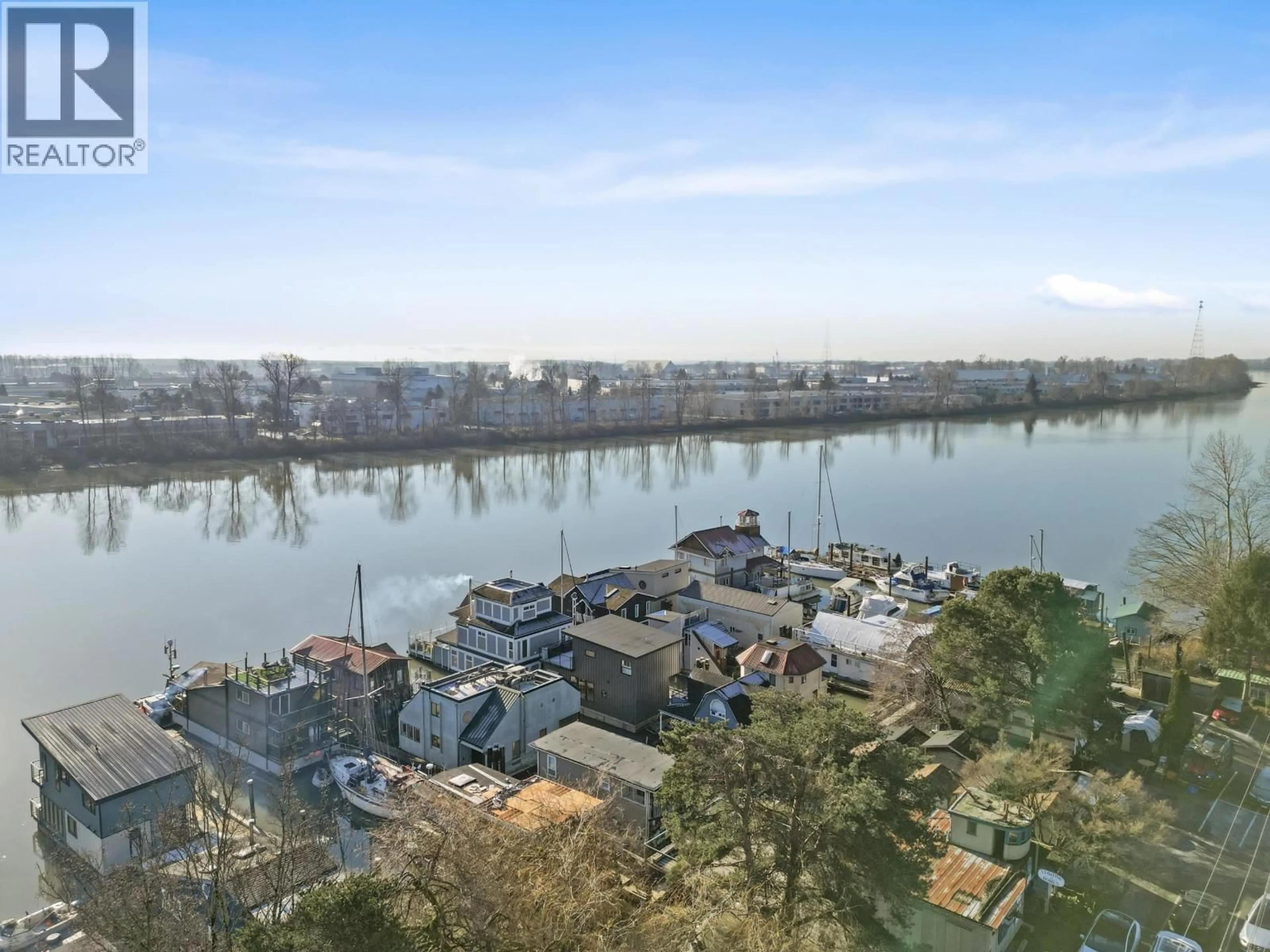 A pic from outside/outdoor area/front of a property/back of a property/a pic from drone, water/lake/river/ocean view for 18 - 23000 DYKE ROAD, Richmond British Columbia V6V2H3