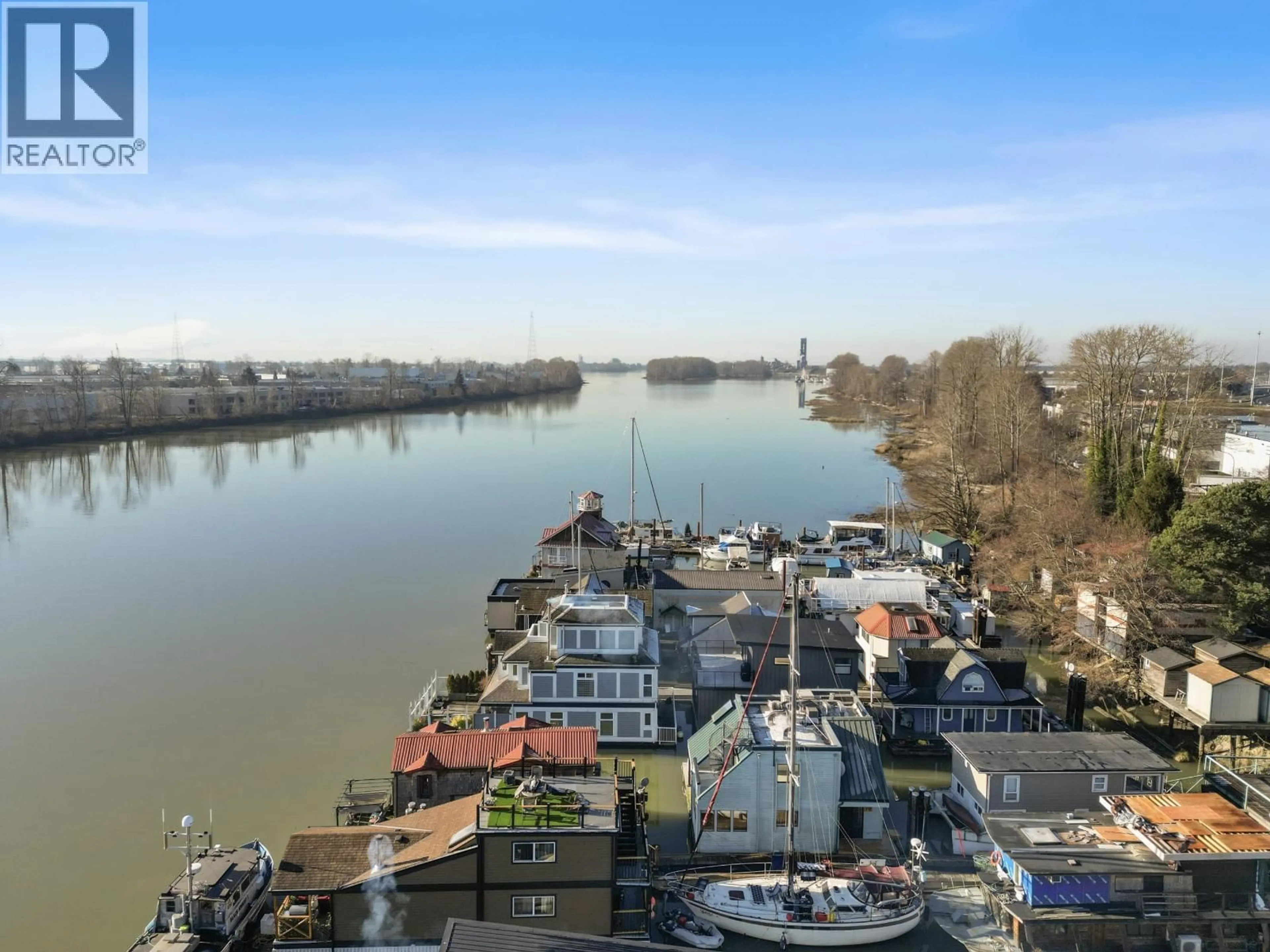 A pic from outside/outdoor area/front of a property/back of a property/a pic from drone, water/lake/river/ocean view for 18 - 23000 DYKE ROAD, Richmond British Columbia V6V2H3