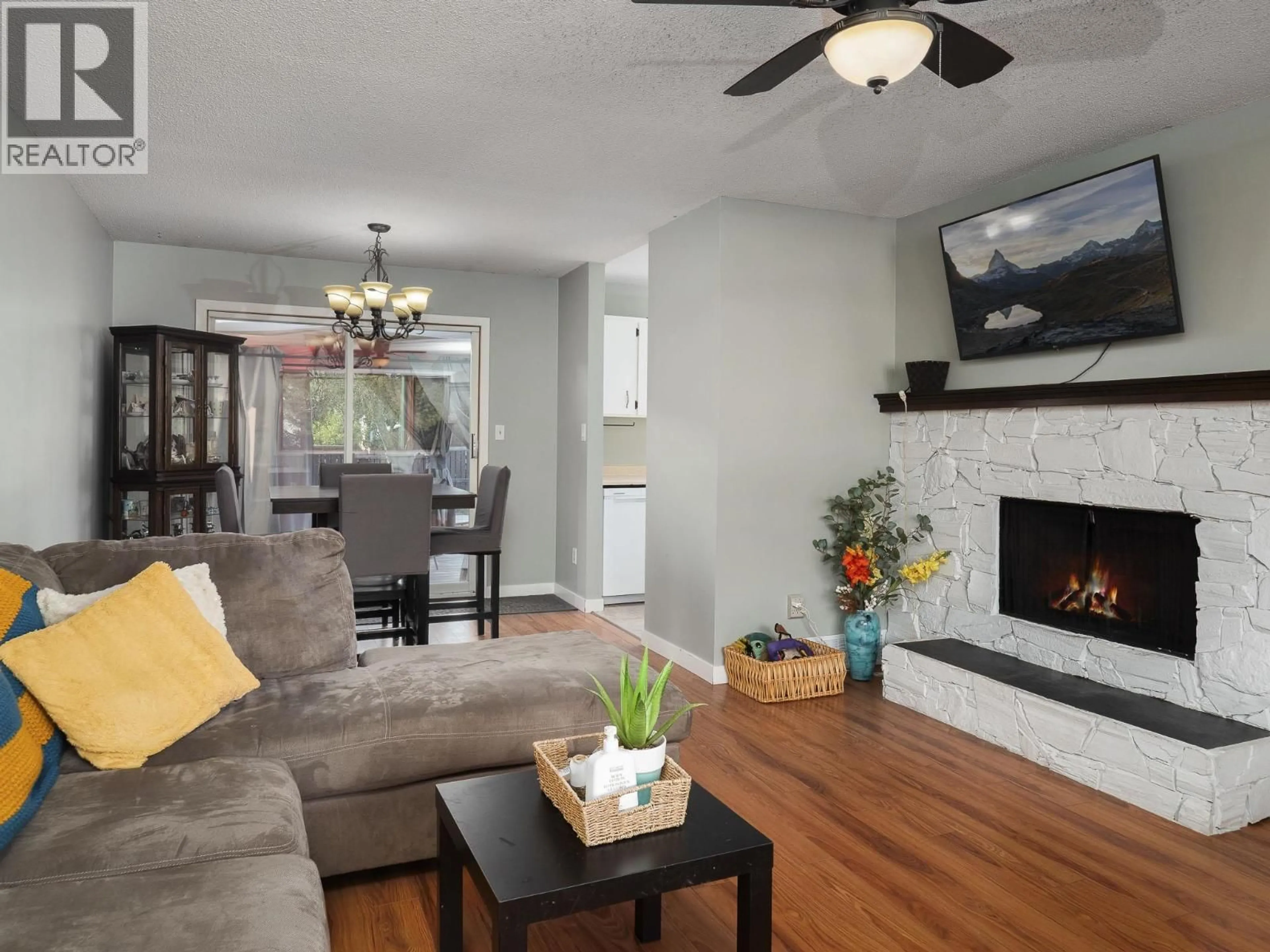 Living room with furniture, wood/laminate floor for 3011 CHRISTOPHER CRESCENT, Prince George British Columbia V2N4R9