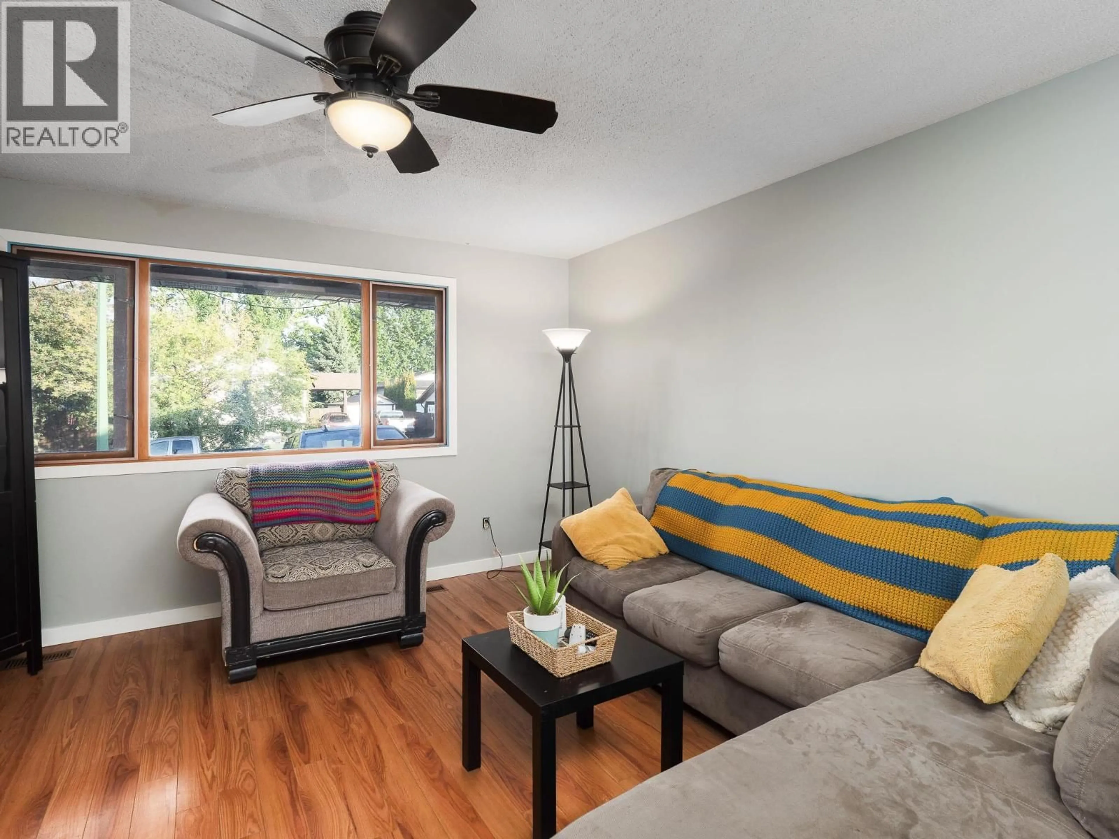 Living room with furniture, wood/laminate floor for 3011 CHRISTOPHER CRESCENT, Prince George British Columbia V2N4R9