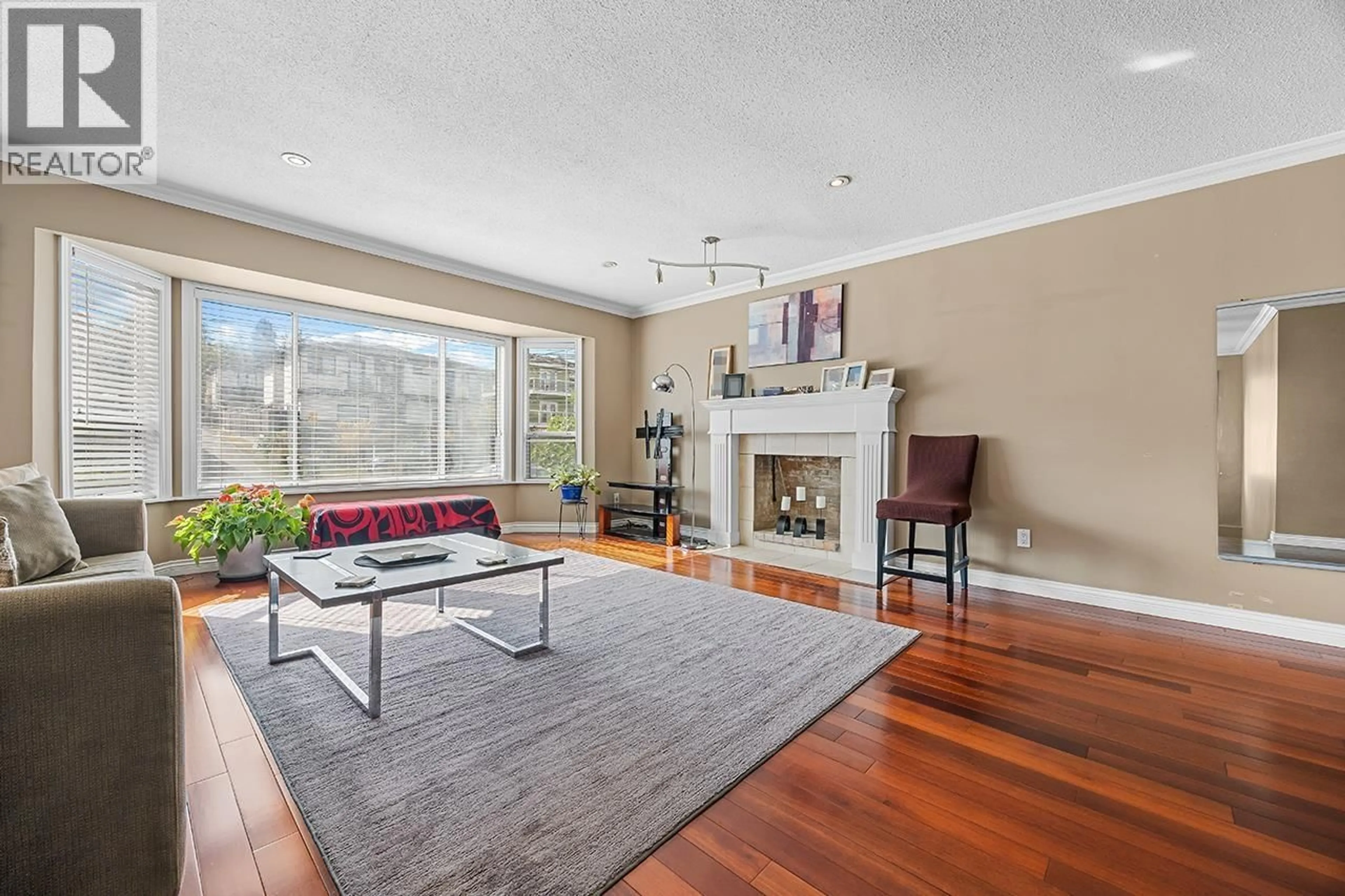 Living room with furniture, wood/laminate floor for 5453 NORFOLK STREET, Burnaby British Columbia V5G1G3