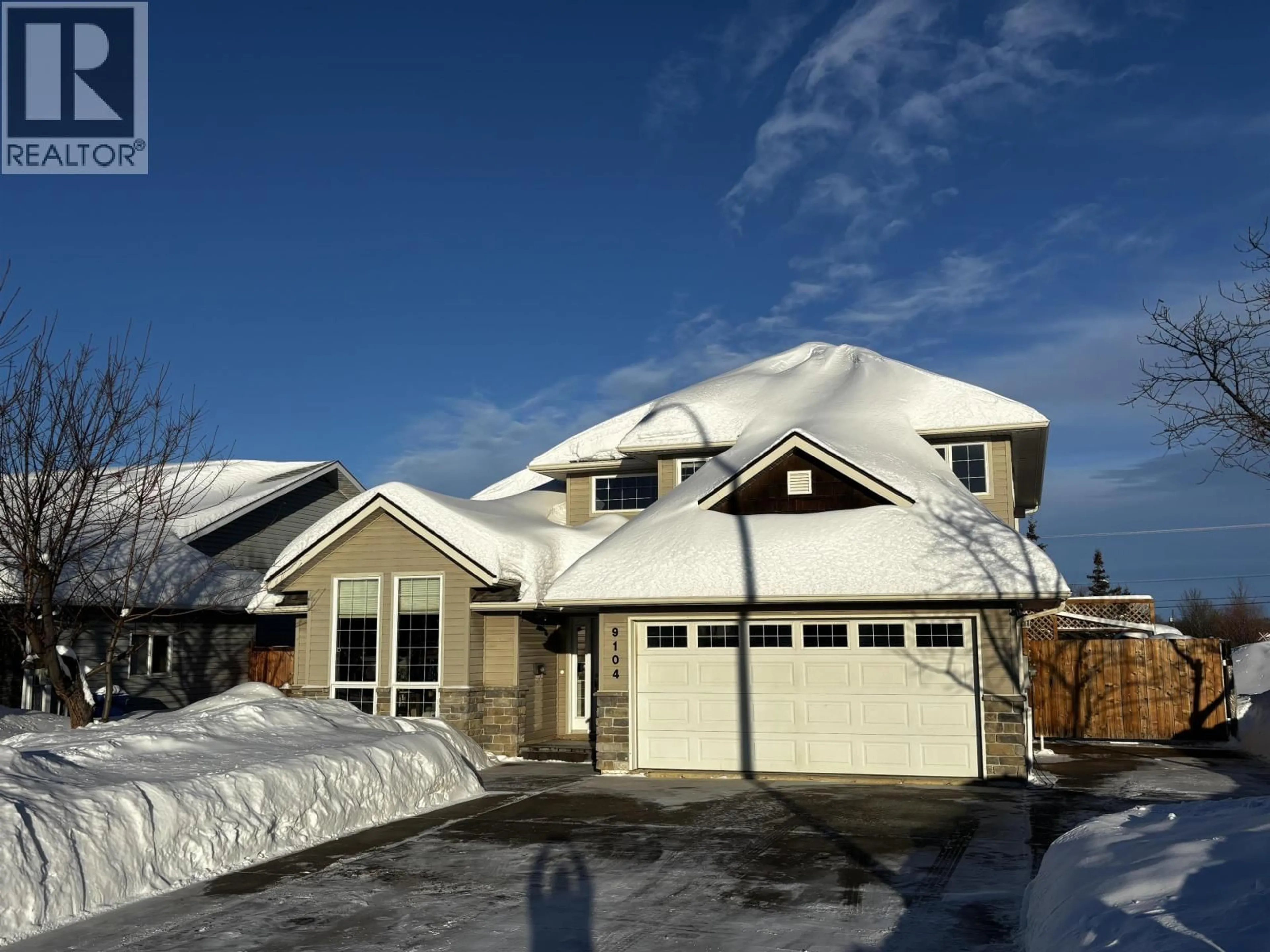 Home with vinyl exterior material, street for 9104 118 AVENUE, Fort St. John British Columbia V1J6Z7