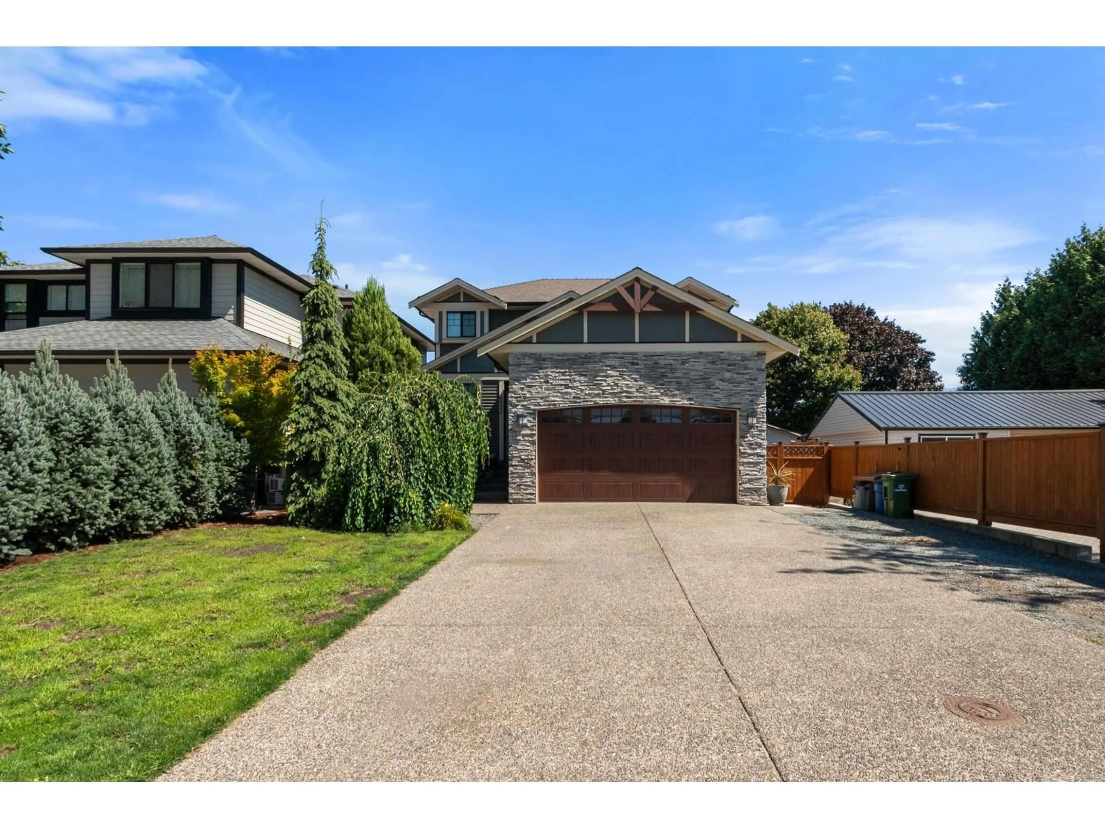 A pic from outside/outdoor area/front of a property/back of a property/a pic from drone, street for 6522 REID ROAD, Chilliwack British Columbia V2R1T9