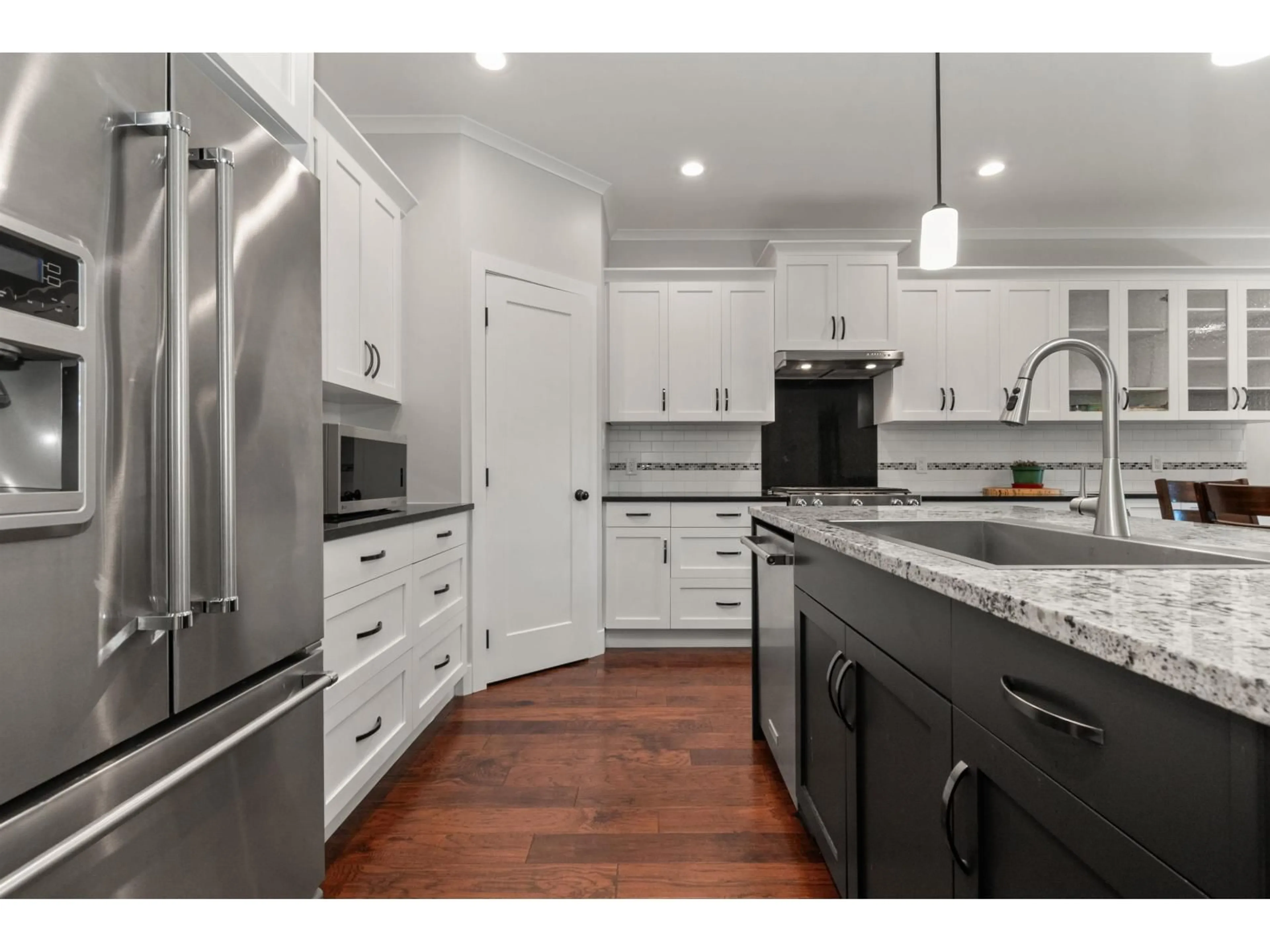 Open concept kitchen, unknown for 6522 REID ROAD, Chilliwack British Columbia V2R1T9