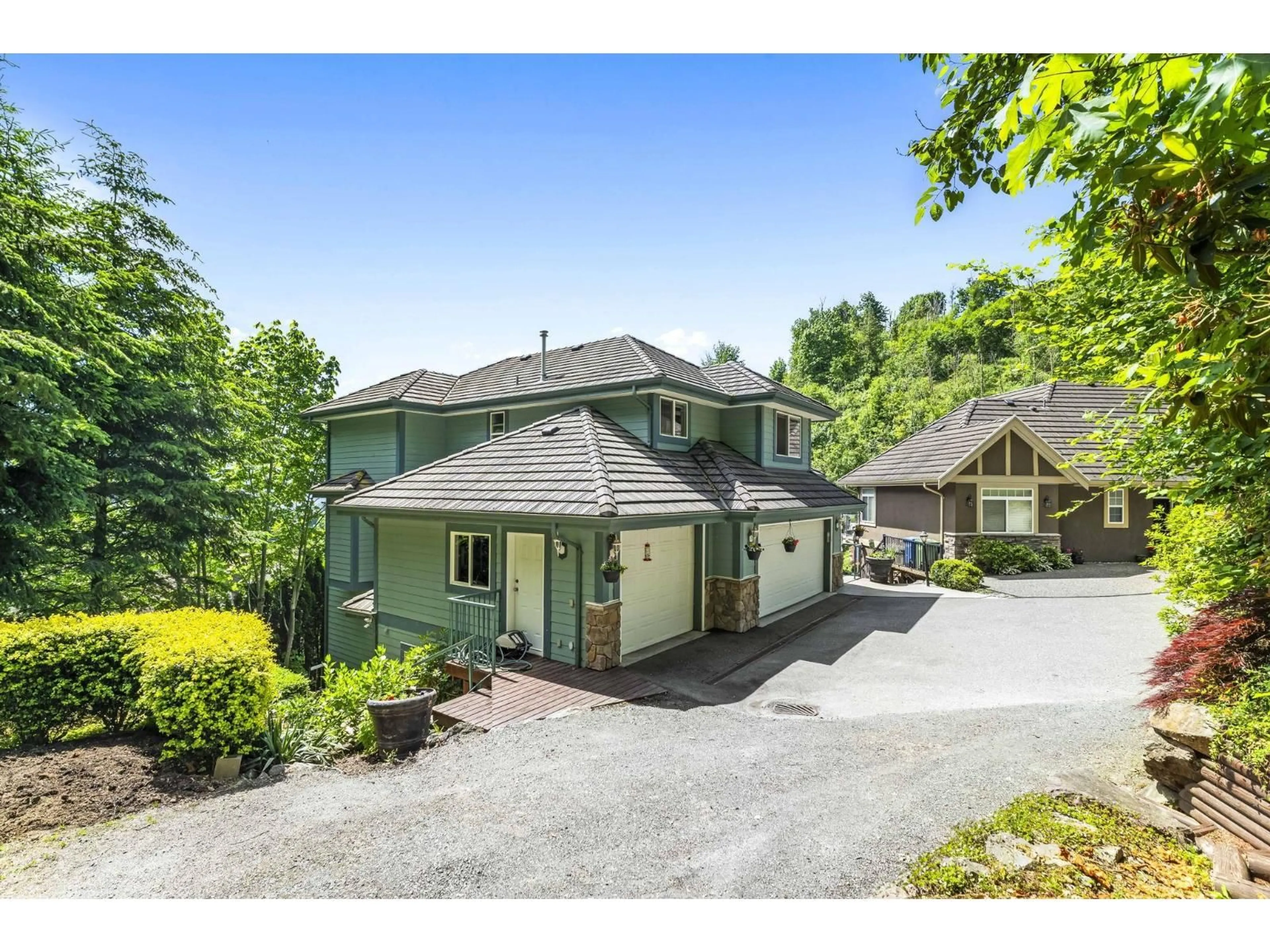 A pic from outside/outdoor area/front of a property/back of a property/a pic from drone, mountain view for 35819 REGAL PARKWAY, Abbotsford British Columbia V3G2W2