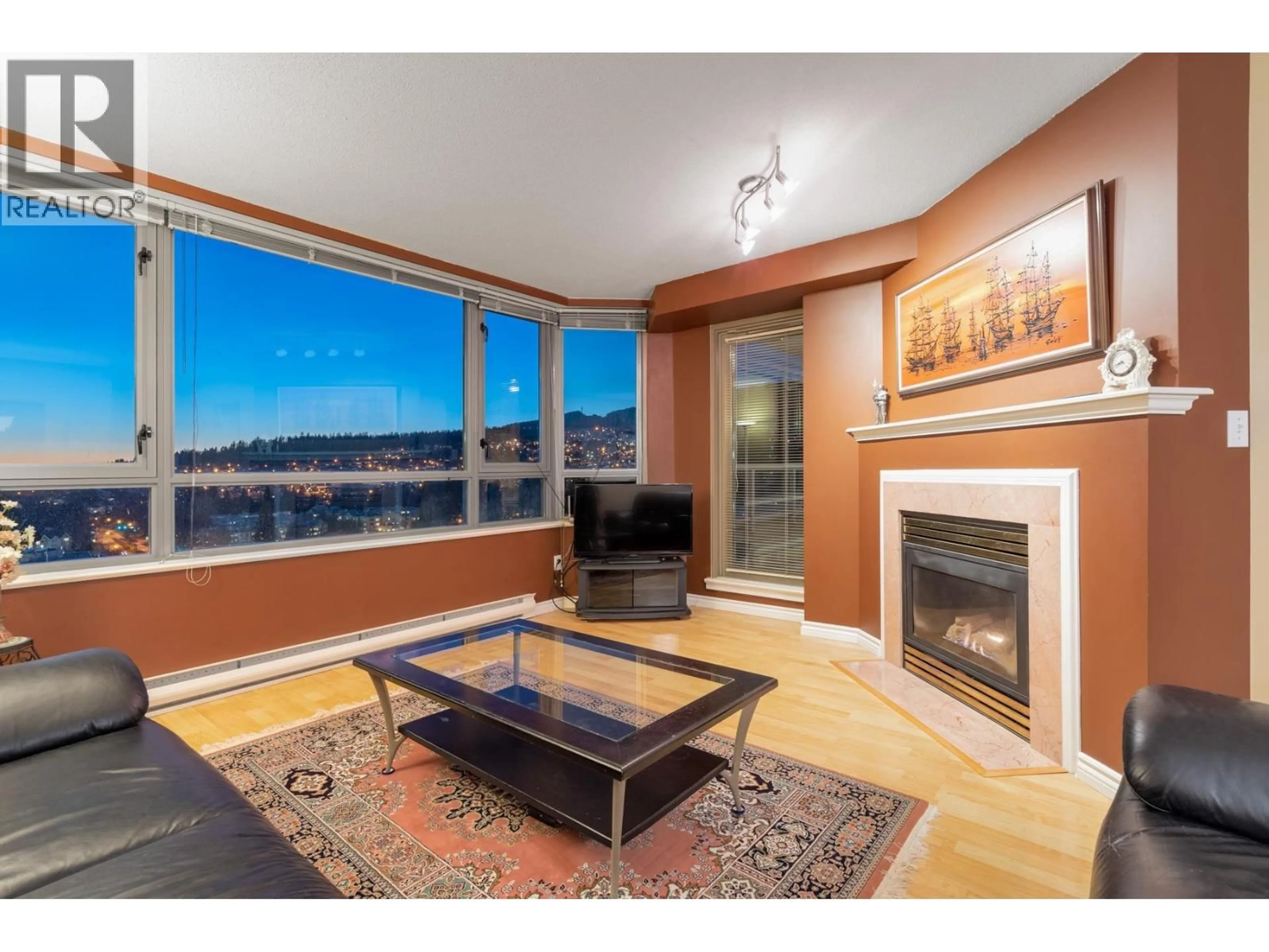 Living room with furniture, unknown for 1502 - 3070 GUILDFORD WAY, Coquitlam British Columbia V3B7R8