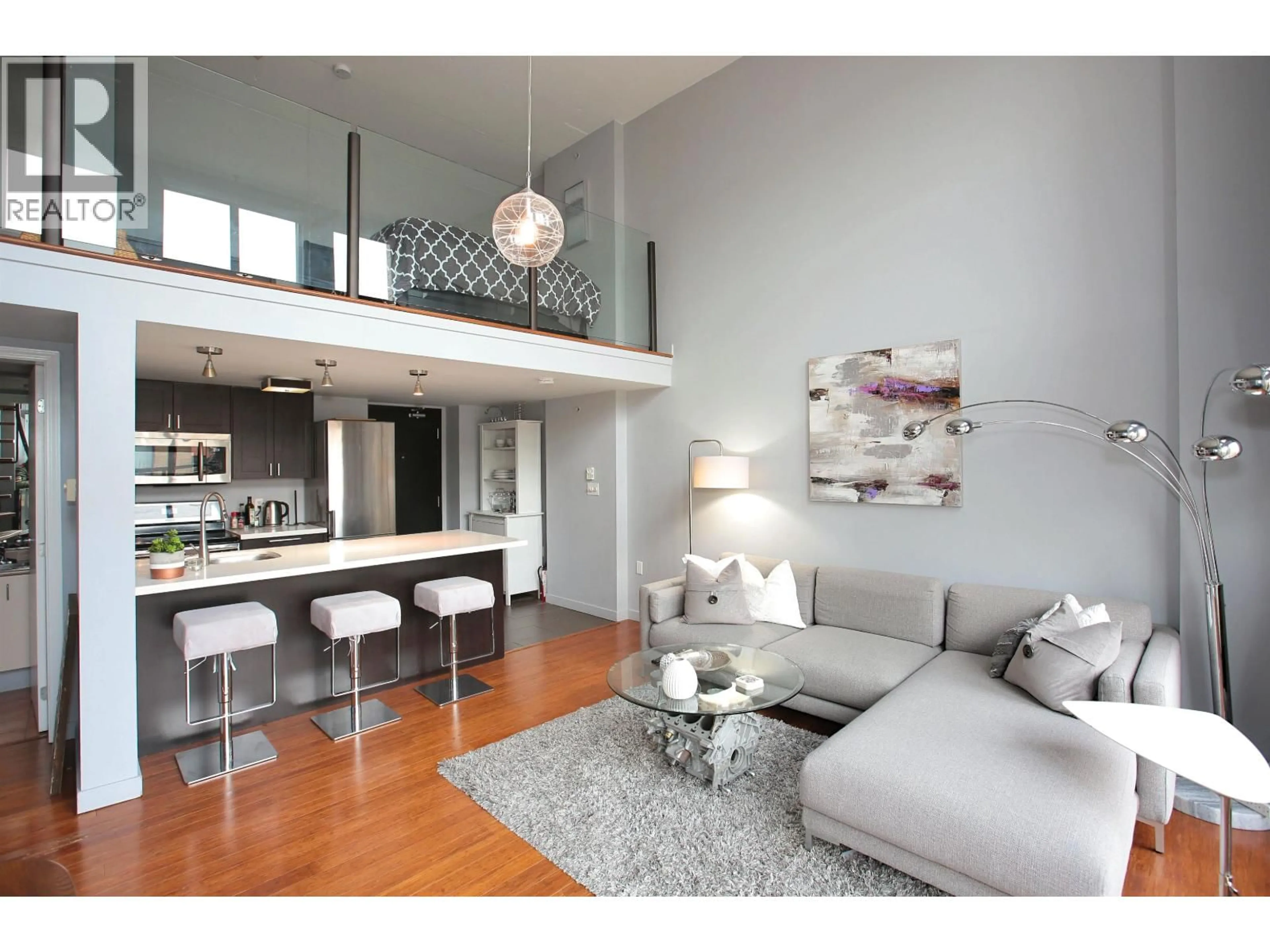 Living room with furniture, wood/laminate floor for 511 - 22 CORDOVA STREET, Vancouver British Columbia V6A1K2