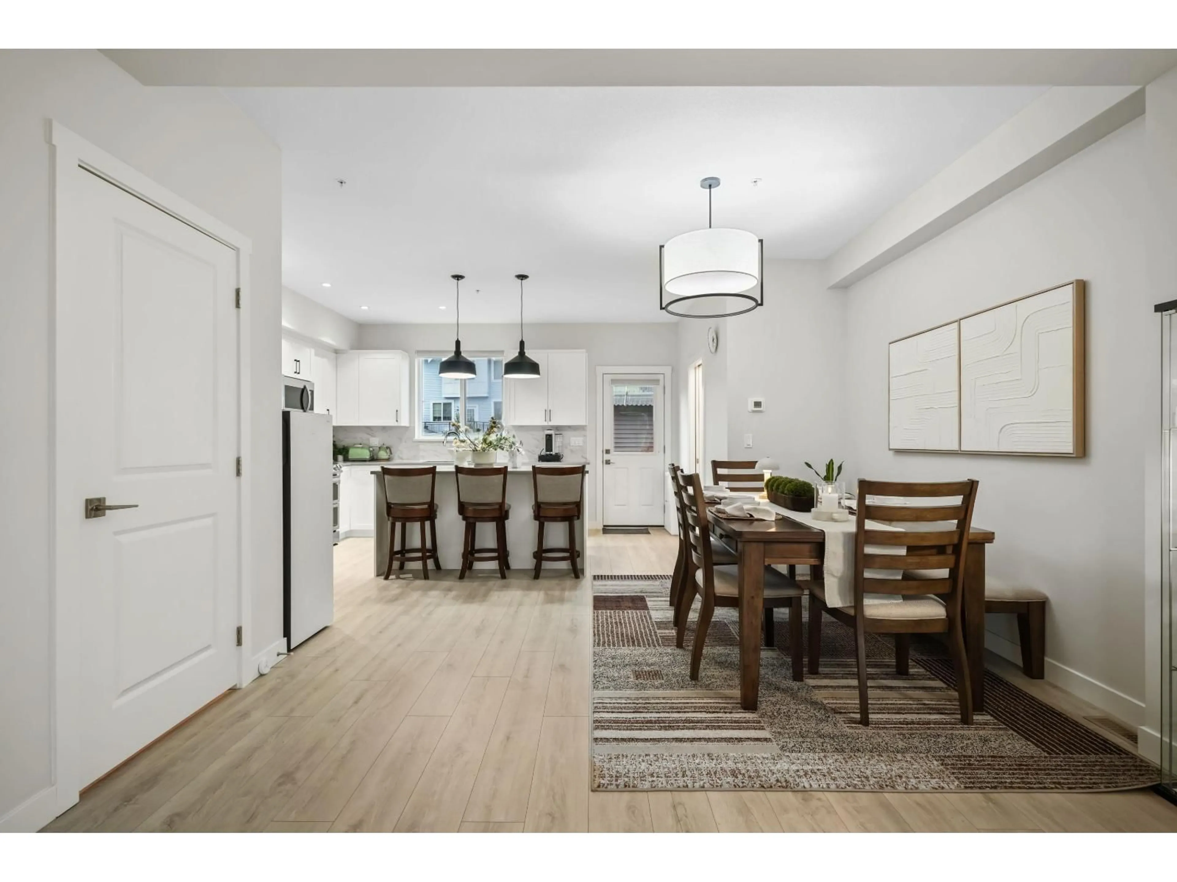 Open concept kitchen, wood/laminate floor for 20181 83 AVENUE, Langley British Columbia V2Y4L1