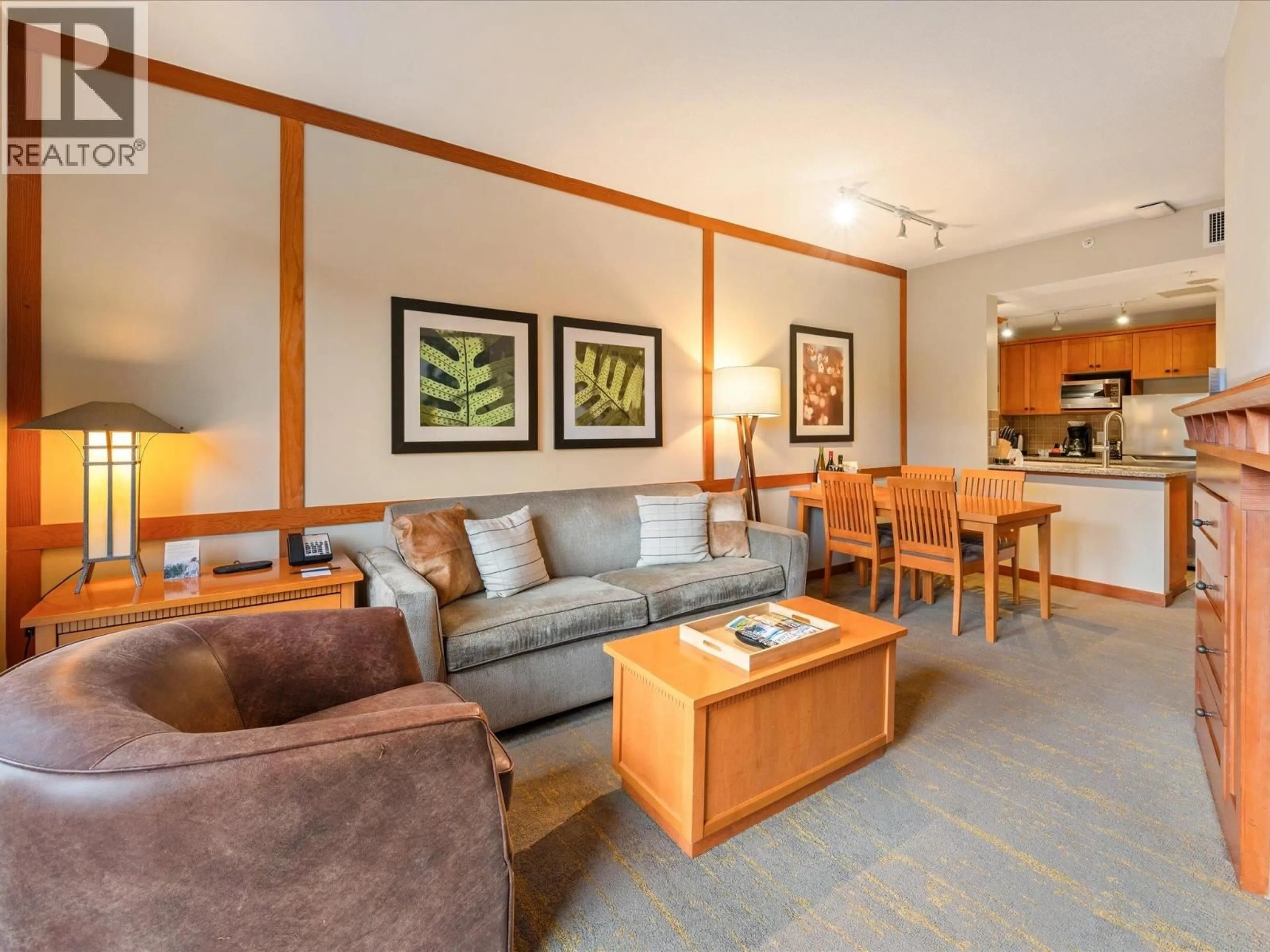 Living room with furniture, wood/laminate floor for 514 - 4320 SUNDIAL CRESCENT, Whistler British Columbia V8E1G6