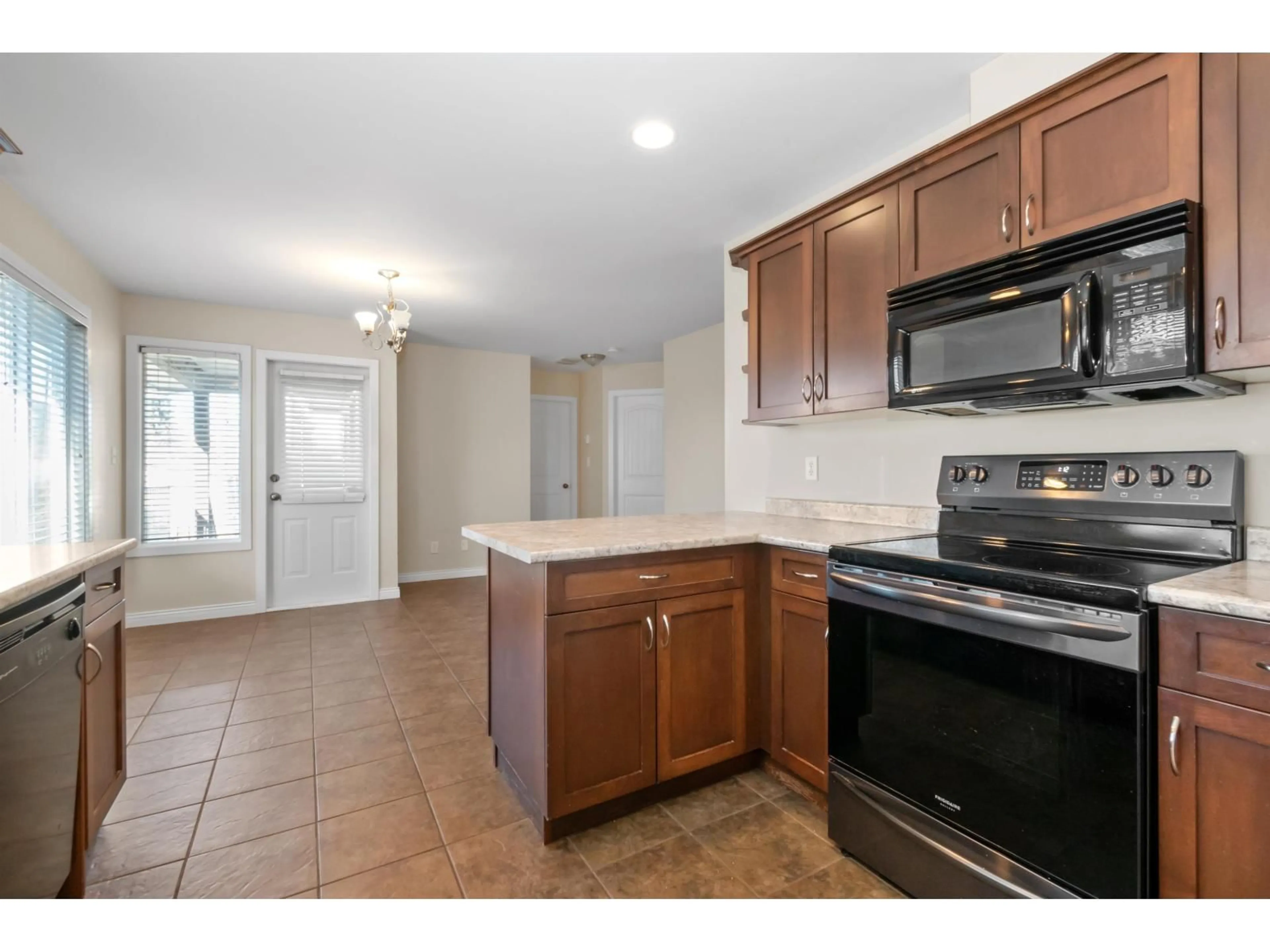 Standard kitchen, ceramic/tile floor for 46151 THIRD AVENUE, Chilliwack British Columbia V2P1R7