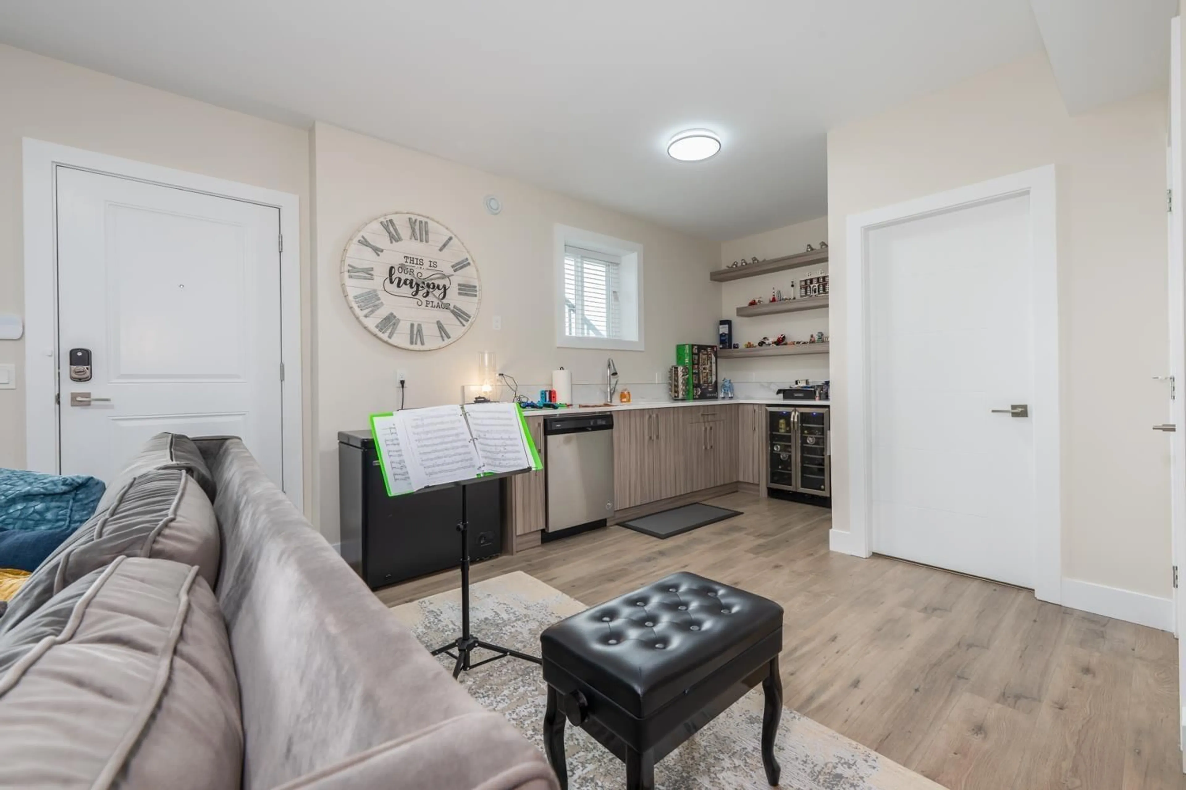 Living room with furniture, wood/laminate floor for 16796 16A AVENUE, Surrey British Columbia V3Z0T3