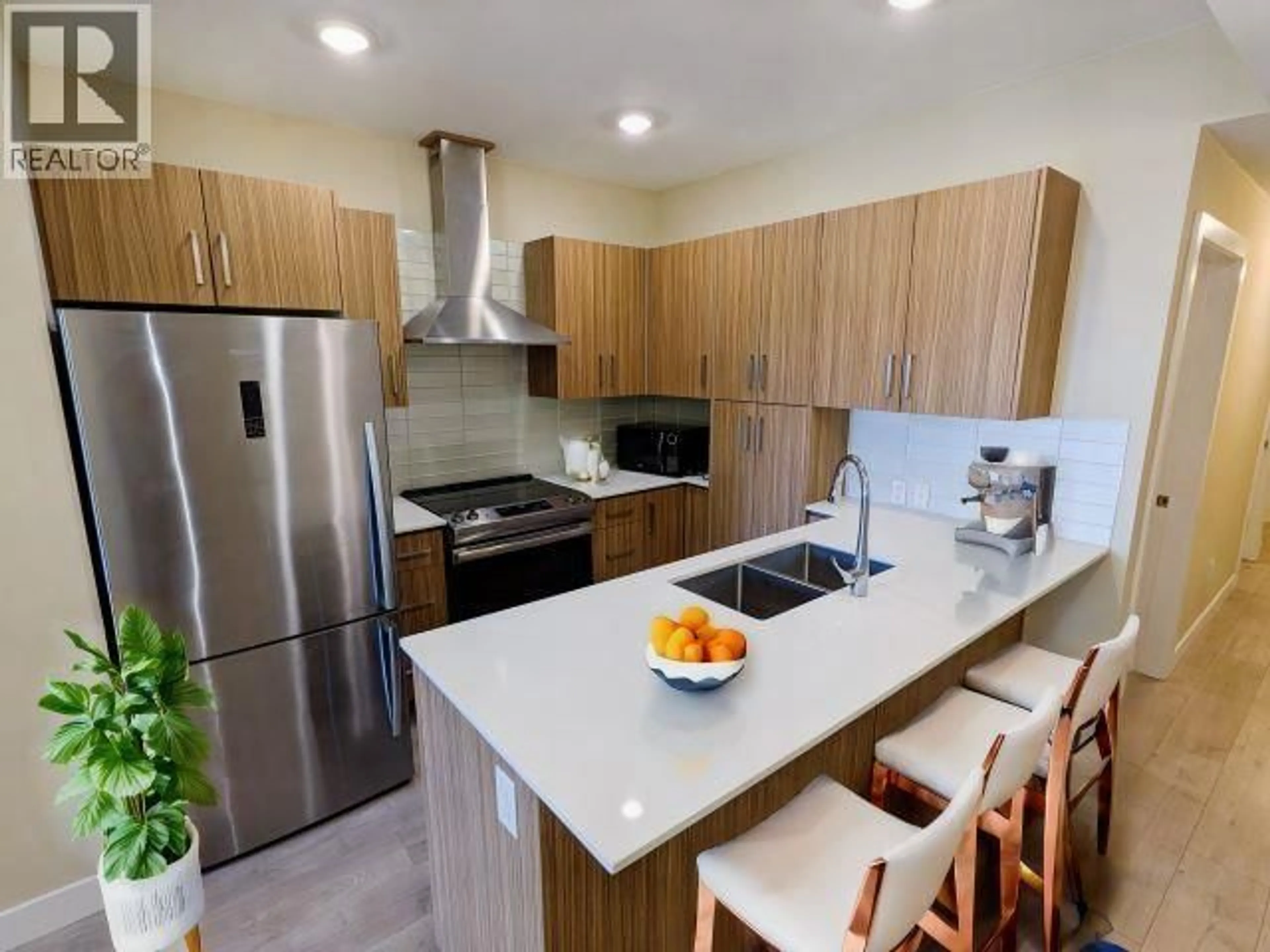Open concept kitchen, unknown for 208 - 2889 1ST AVENUE, Vancouver British Columbia V5M0G2