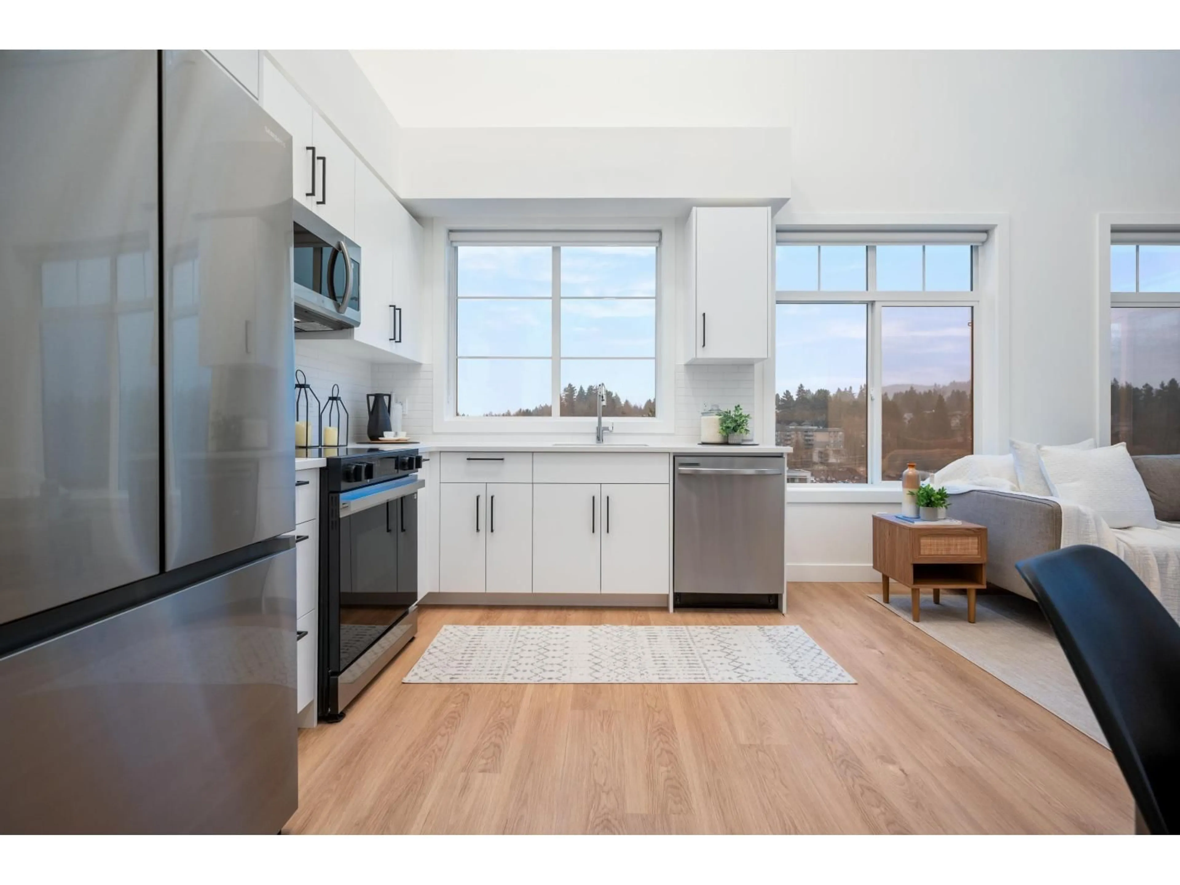 Open concept kitchen, wood/laminate floor for 506 - 33816 SOUTH FRASER WAY, Abbotsford British Columbia V2S0P2