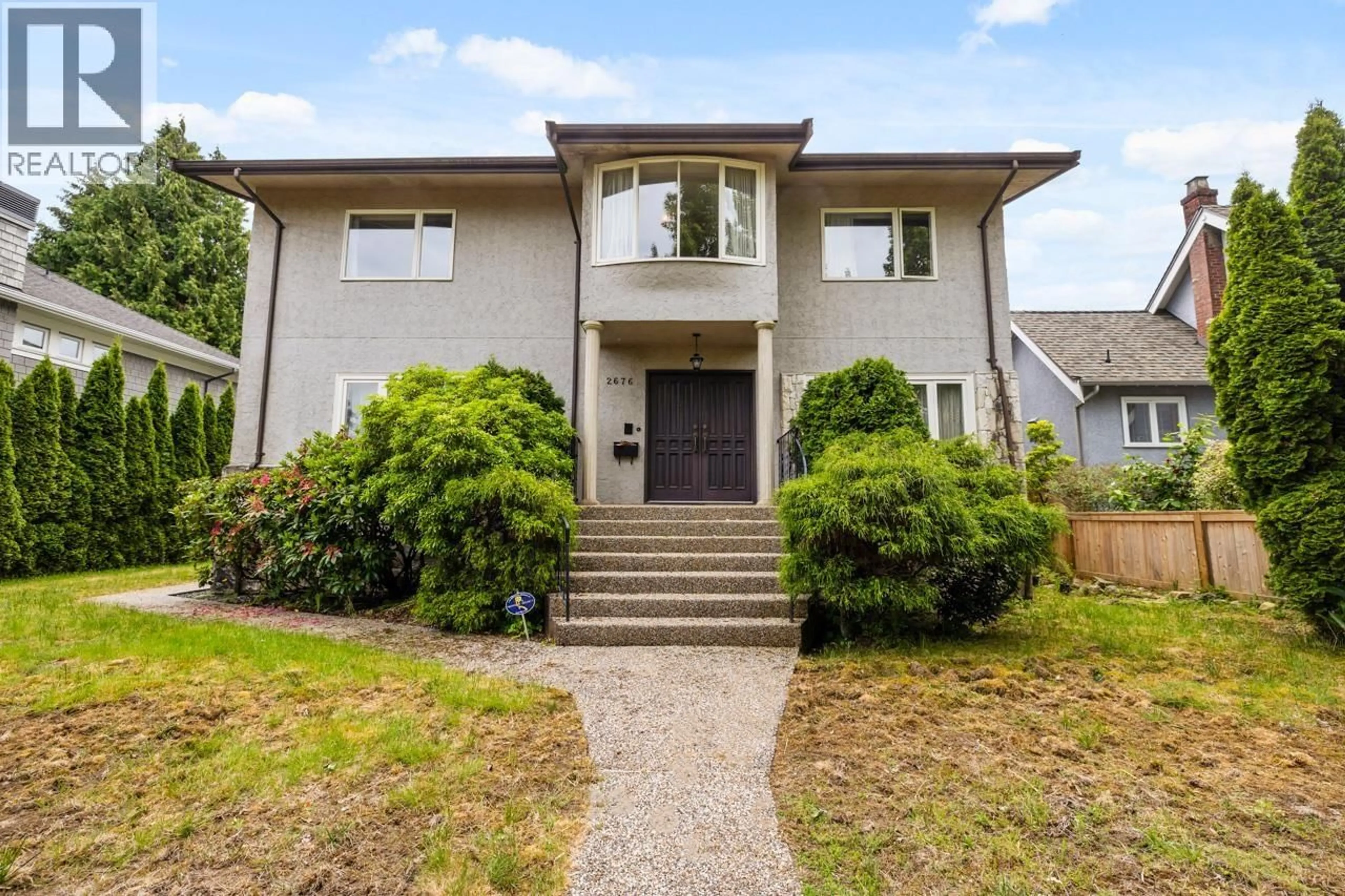 Home with vinyl exterior material, street for 2676 33RD AVENUE, Vancouver British Columbia V6N2E6