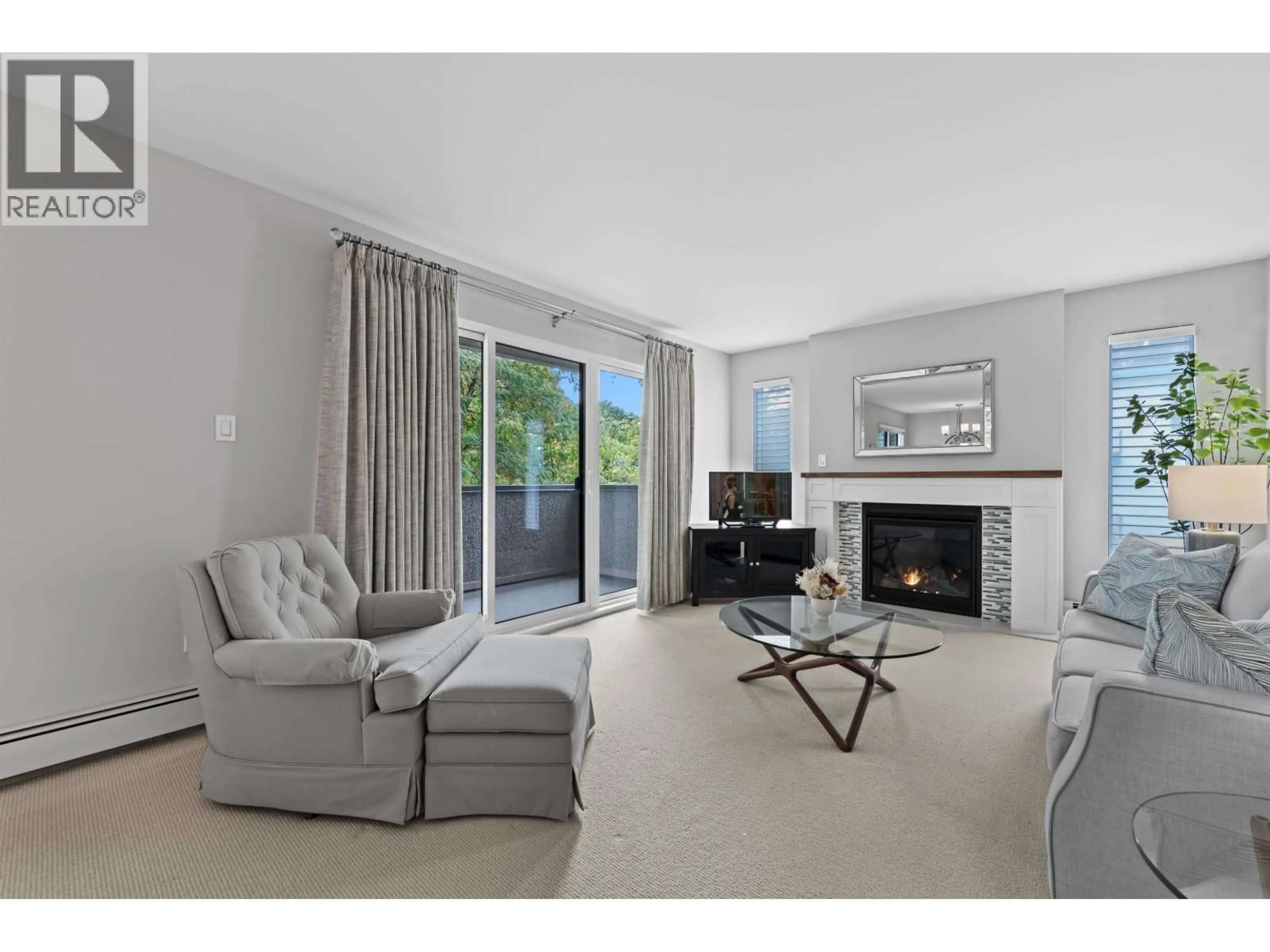 Living room with furniture, unknown for 305 - 8775 CARTIER STREET, Vancouver British Columbia V6P4V3