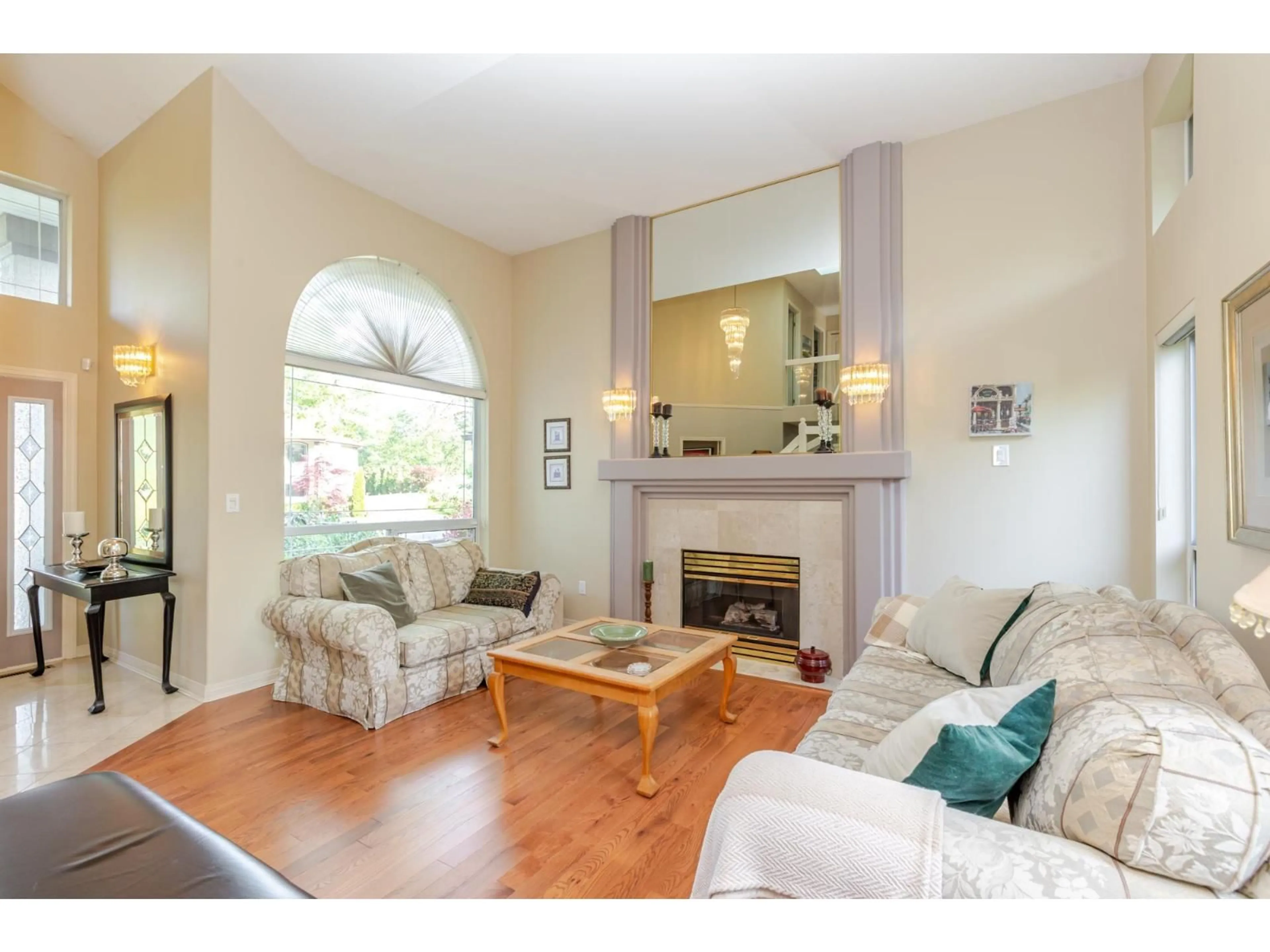 Living room with furniture, wood/laminate floor for 7931 REDTAIL PLACE, Surrey British Columbia V3W0N4