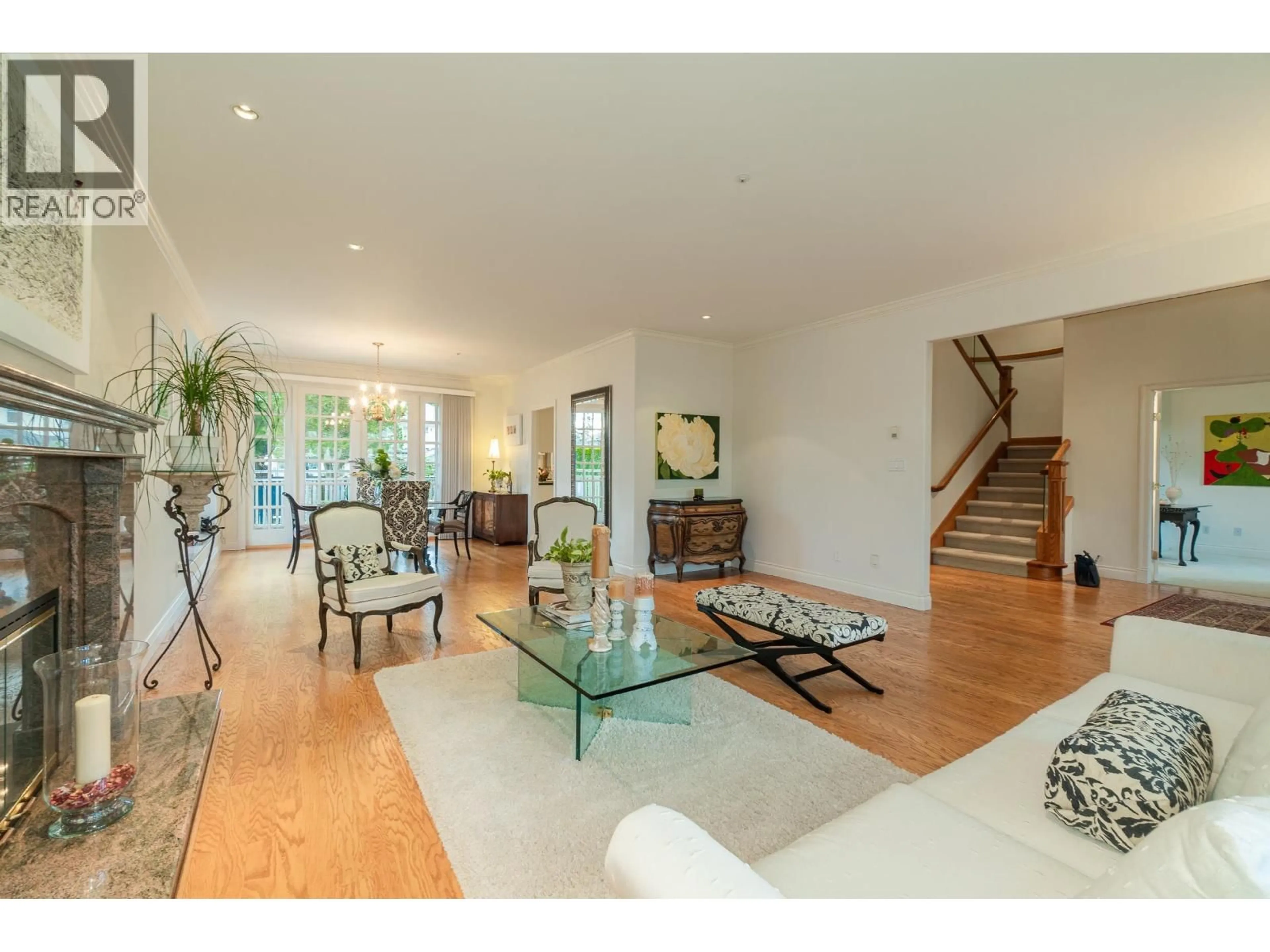 Living room with furniture, wood/laminate floor for 6787 MONTGOMERY STREET, Vancouver British Columbia V6P4G3