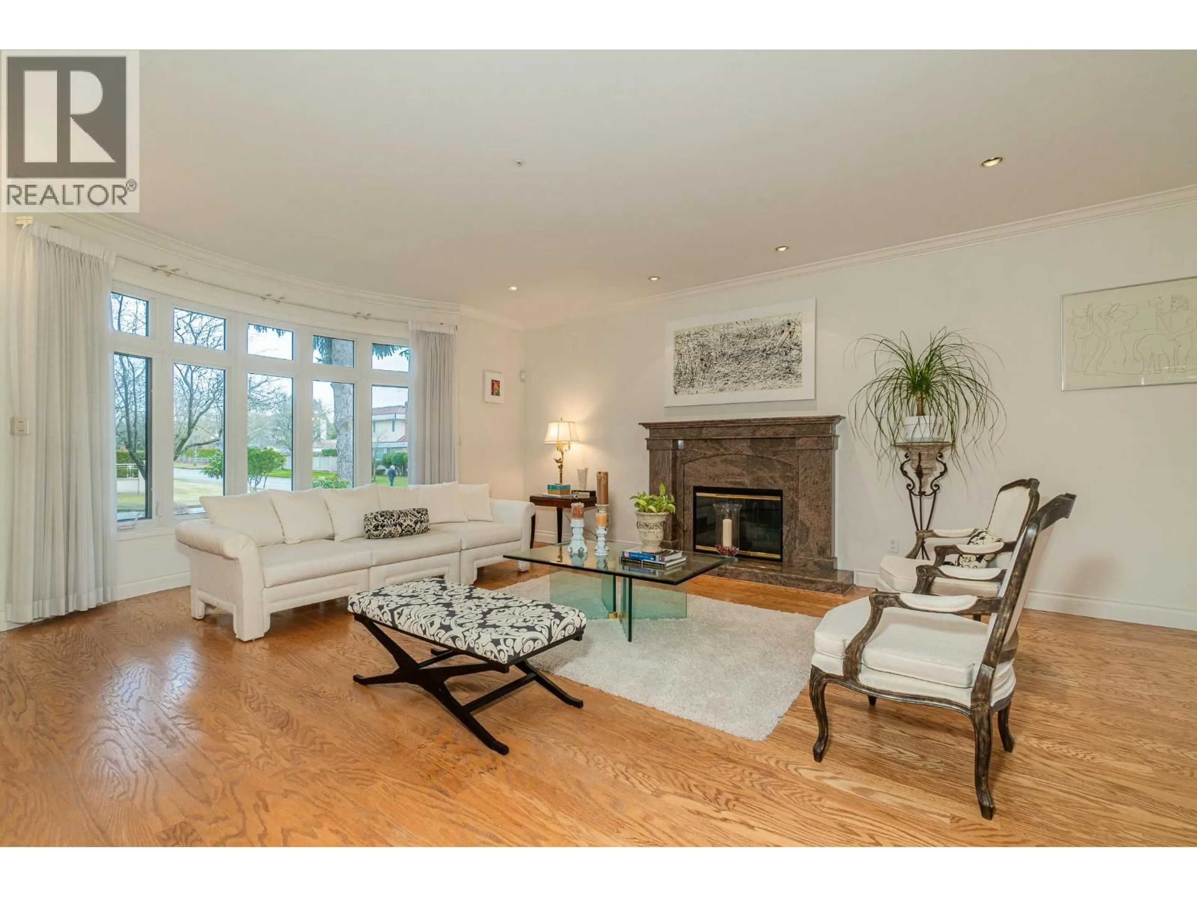 Living room with furniture, wood/laminate floor for 6787 MONTGOMERY STREET, Vancouver British Columbia V6P4G3