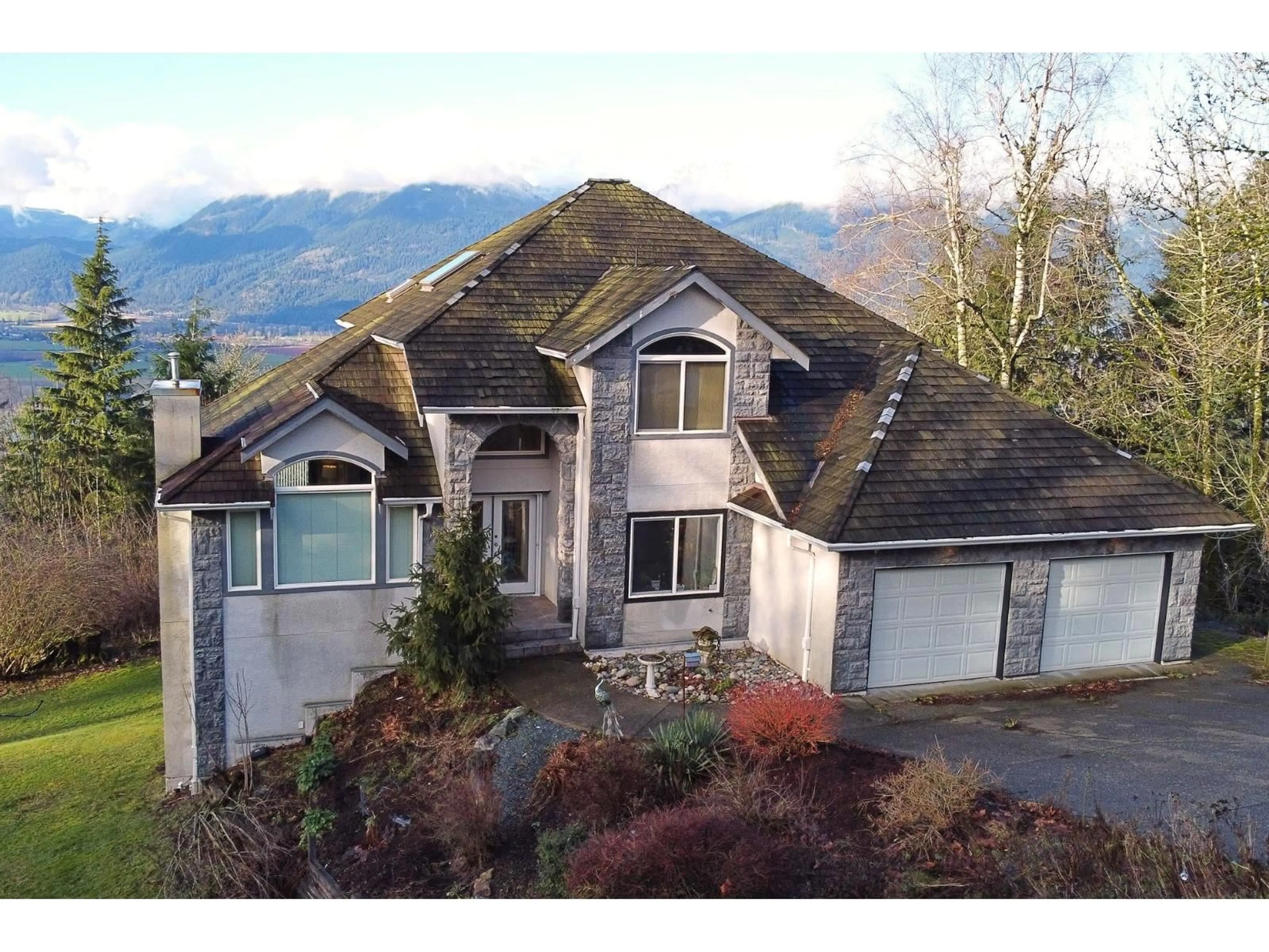 A pic from outside/outdoor area/front of a property/back of a property/a pic from drone, mountain view for 8439 GRAND VIEW DRIVE, Chilliwack British Columbia V2R4A2