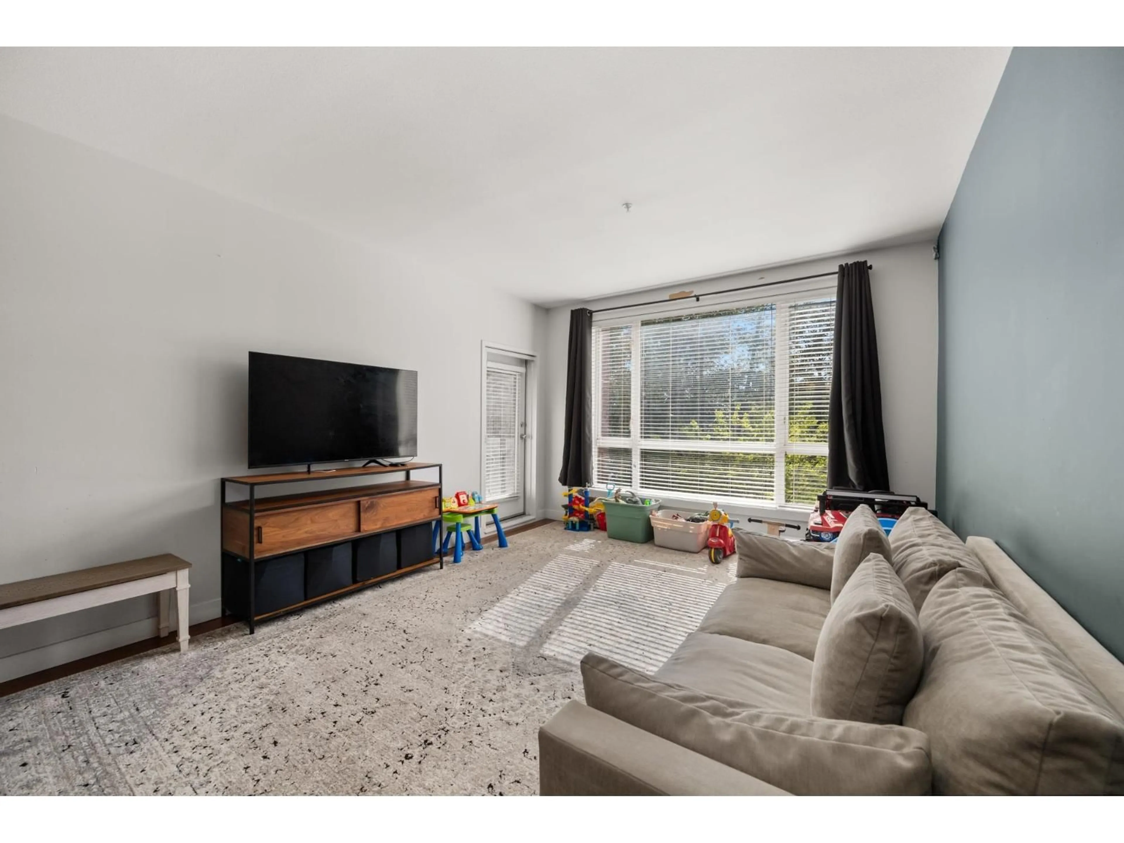 Living room with furniture, unknown for 303 - 14333 104 AVENUE, Surrey British Columbia V3T0E1