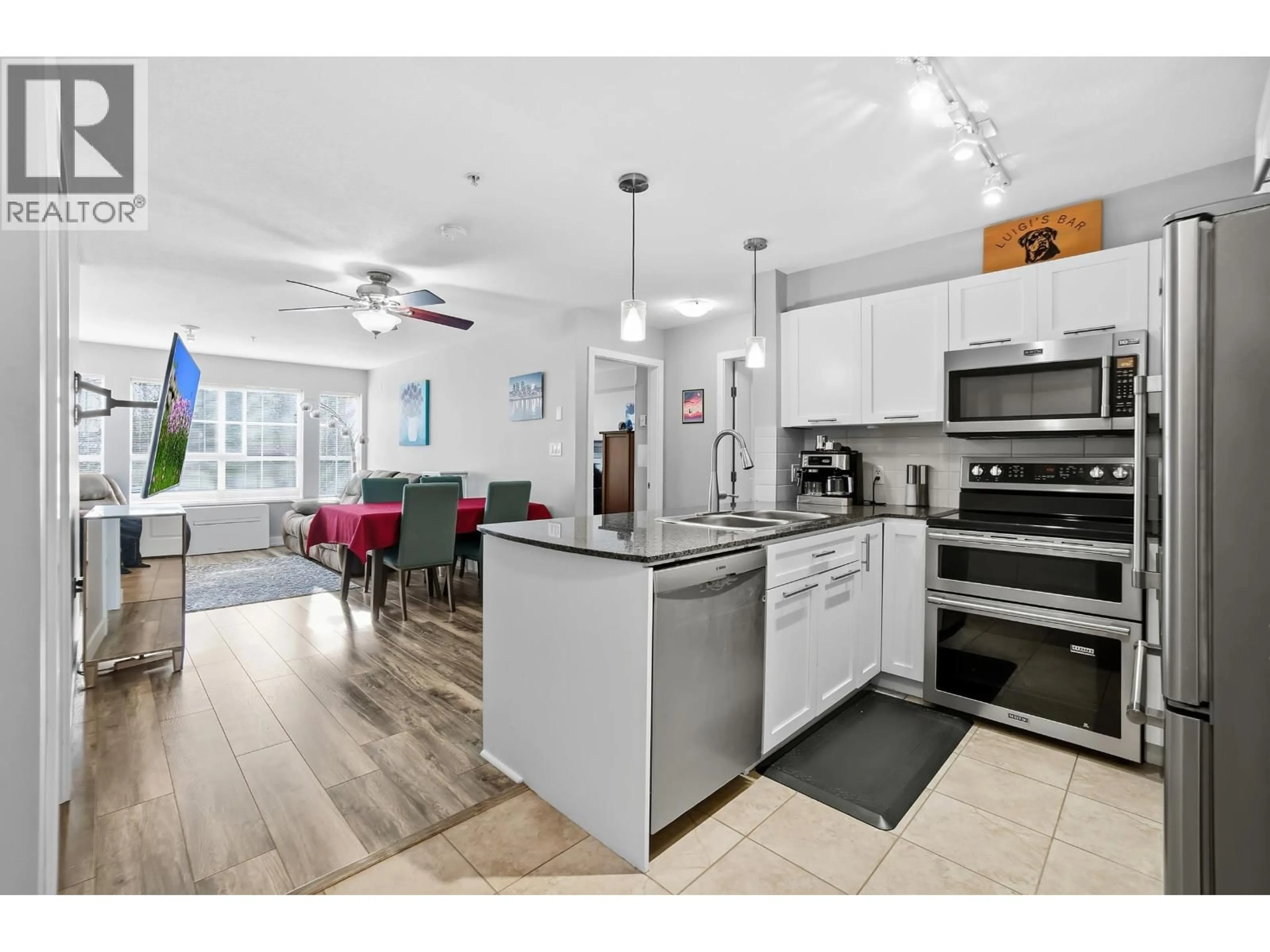 Open concept kitchen, unknown for 211 - 19677 MEADOW GARDENS WAY, Pitt Meadows British Columbia V3Y0A2