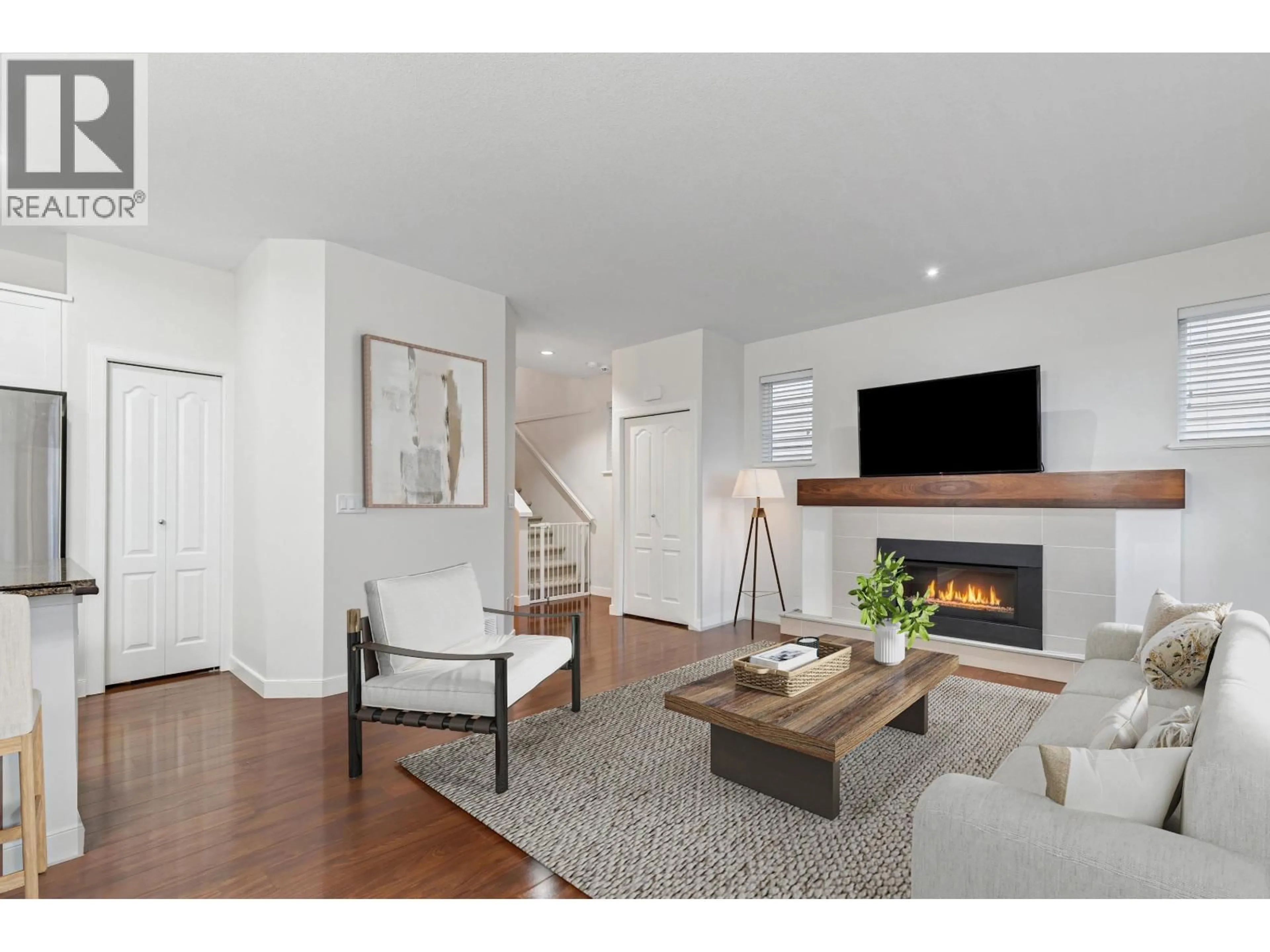 Living room with furniture, wood/laminate floor for 2 - 312 CASEY STREET, Coquitlam British Columbia V3K0C6