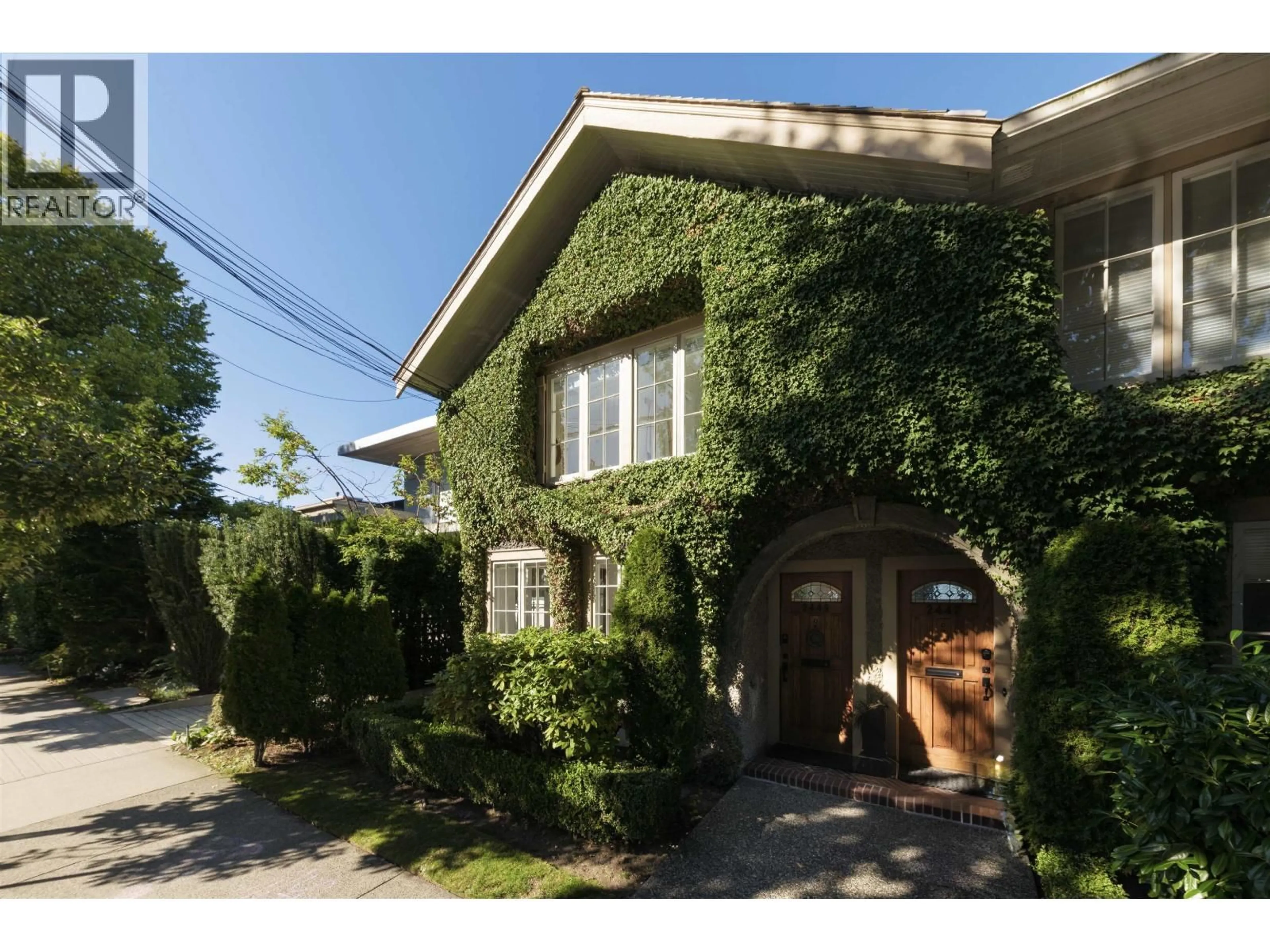 Home with brick exterior material, street for 2449 POINT GREY ROAD, Vancouver British Columbia V6K1A1