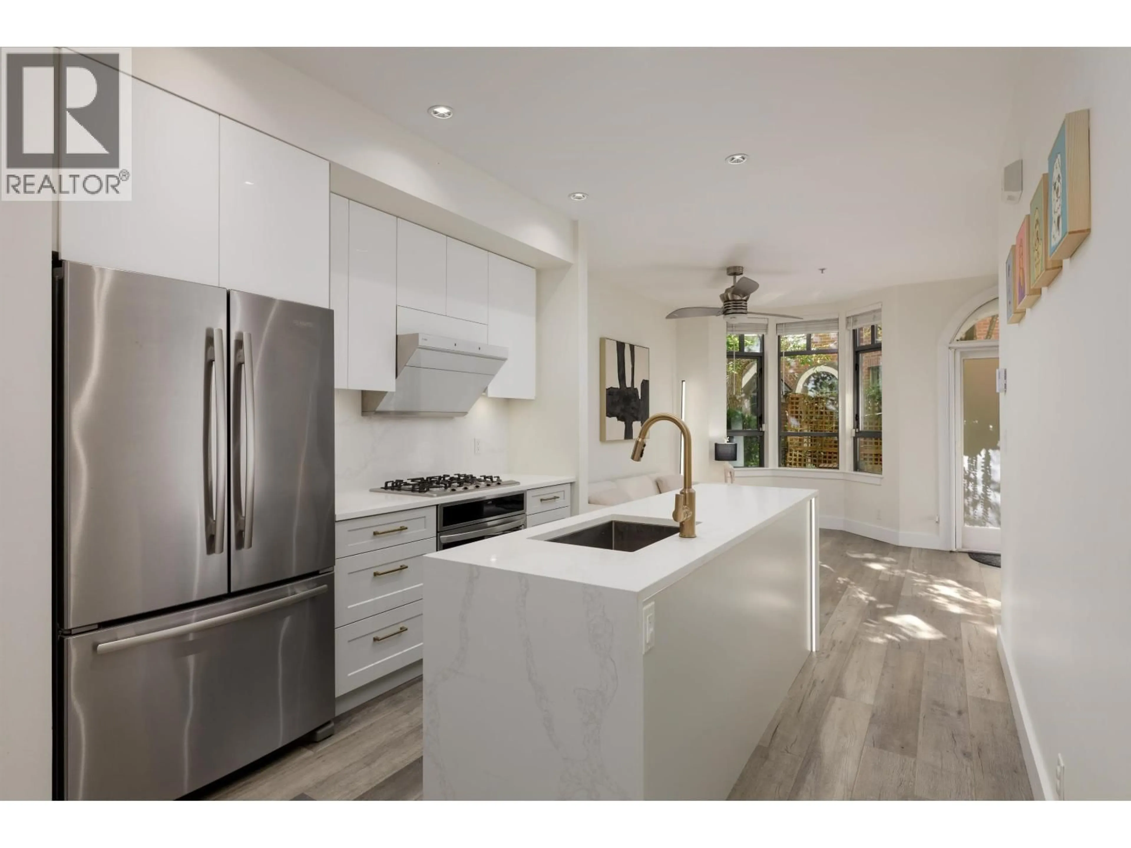 Open concept kitchen, ceramic/tile floor for 828 6TH AVENUE, Vancouver British Columbia V5Z1A6