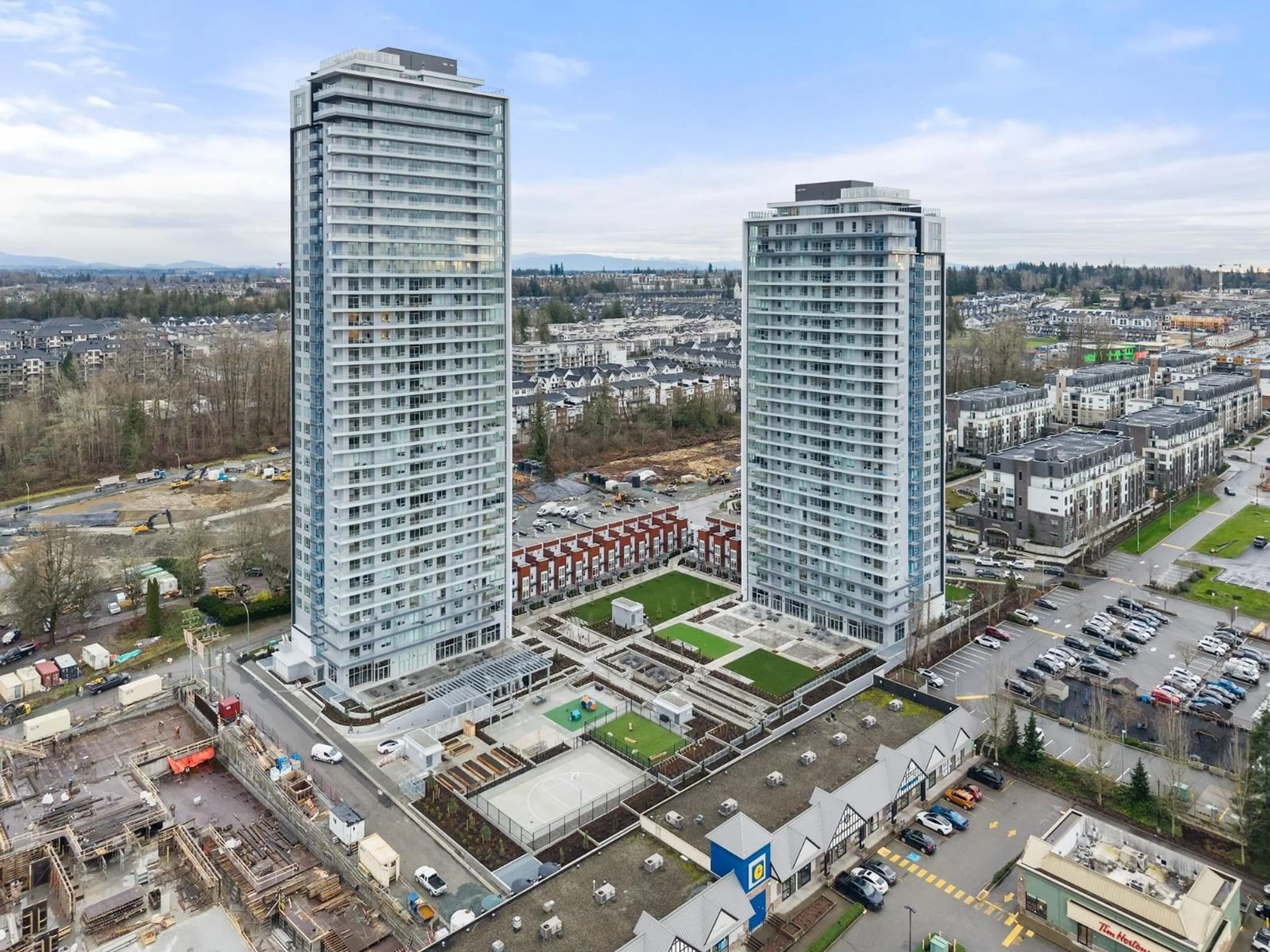 A pic from outside/outdoor area/front of a property/back of a property/a pic from drone, city buildings view from balcony for 3302 - 8551 201 STREET, Langley British Columbia V2Y3Y5