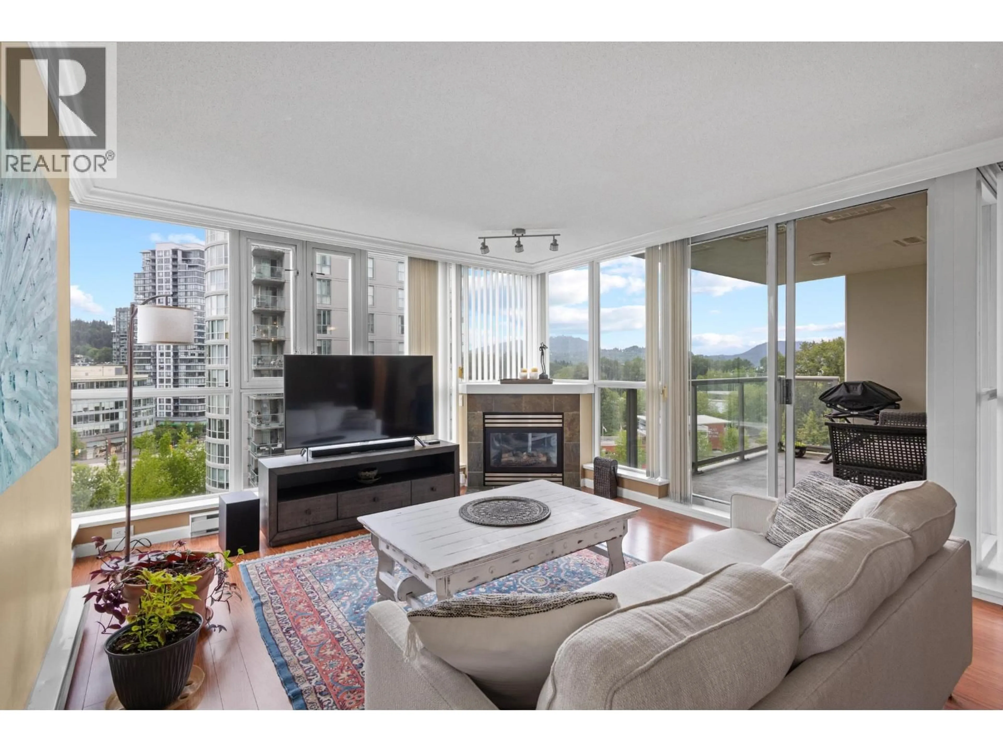 Living room with furniture, unknown for 903 - 235 GUILDFORD WAY, Port Moody British Columbia V3H5L8