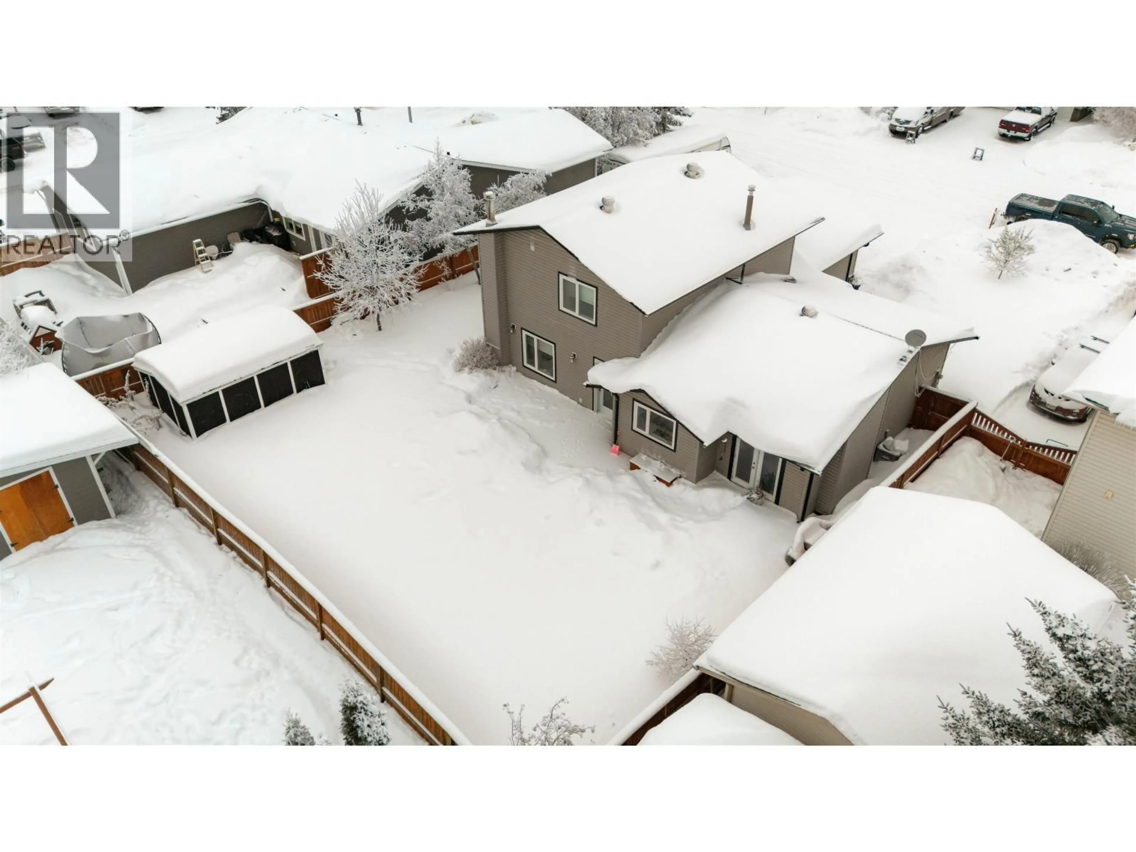 A pic from outside/outdoor area/front of a property/back of a property/a pic from drone, street for 10515 114 AVENUE, Fort St. John British Columbia V1J6H7