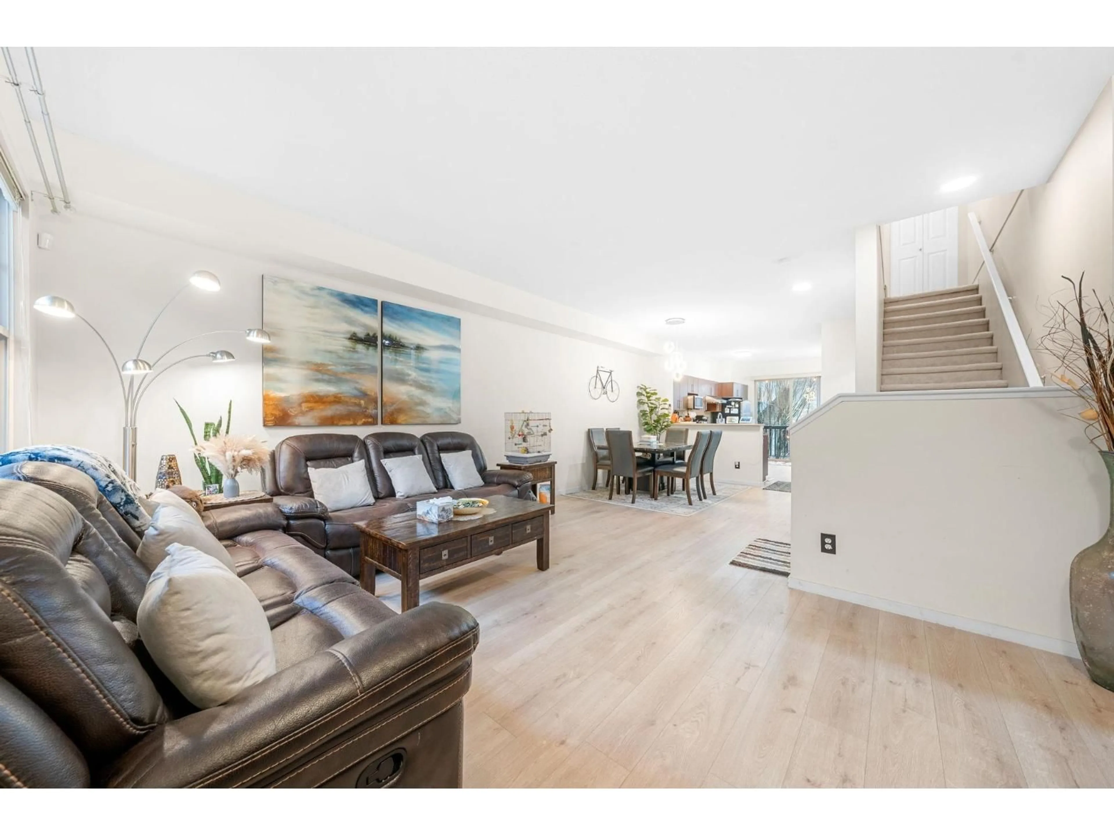 Living room with furniture, wood/laminate floor for 95 - 15152 62A AVENUE, Surrey British Columbia V3S1V1